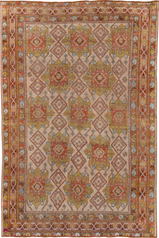 4' x 5' one-of-a-kind handmade vintage Afshar small size rug. Color palette: brown, gray, light gray, off-white, orange