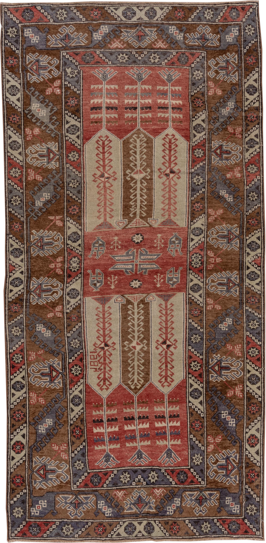 4' x 8' one-of-a-kind handmade vintage Konya runner rug. Color palette: brown, gray, pink, red