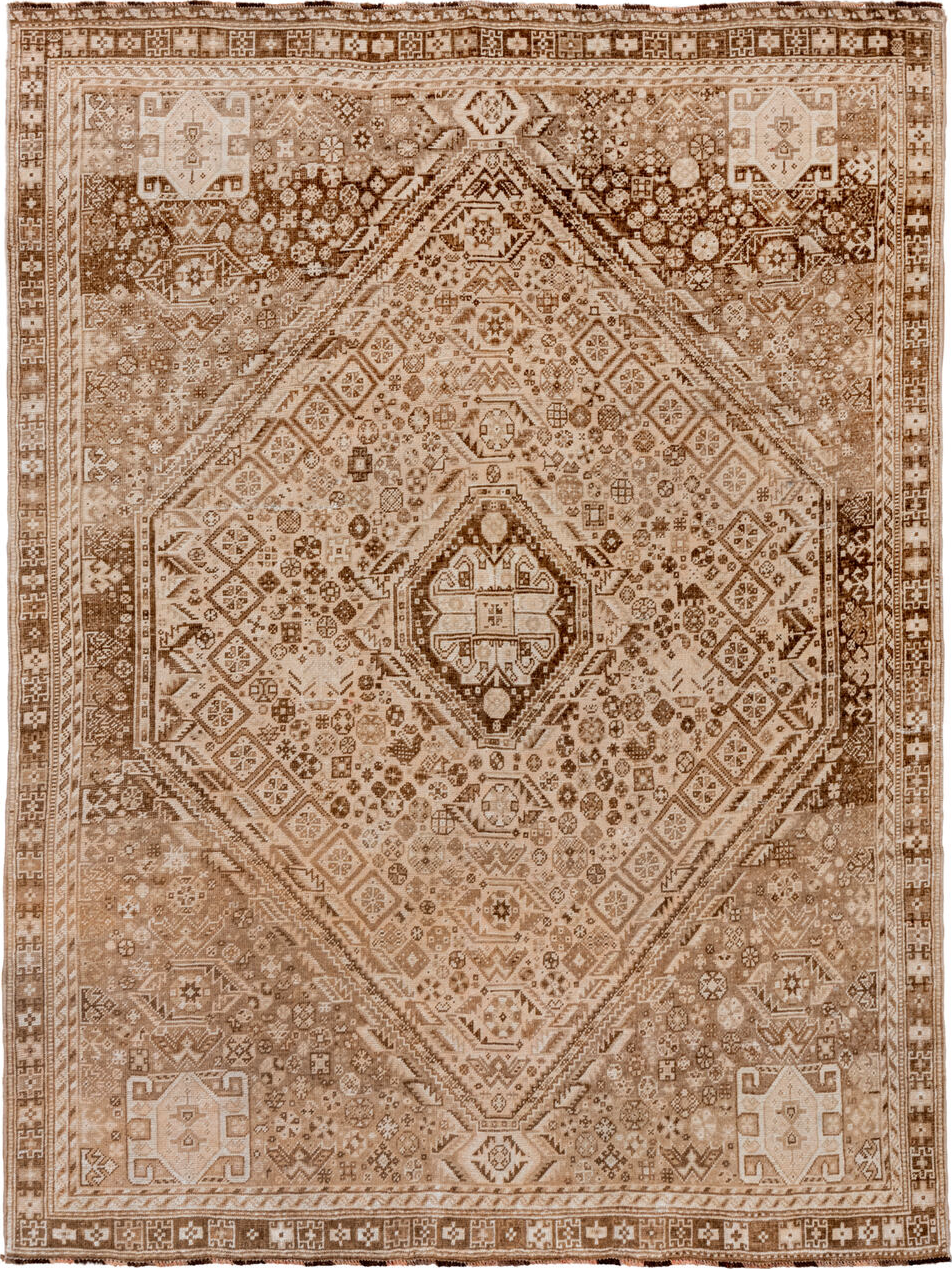 7' x 9' one-of-a-kind handmade vintage Shiraz rug. Color palette: brown, orange, off-white, gray, light gray, tan