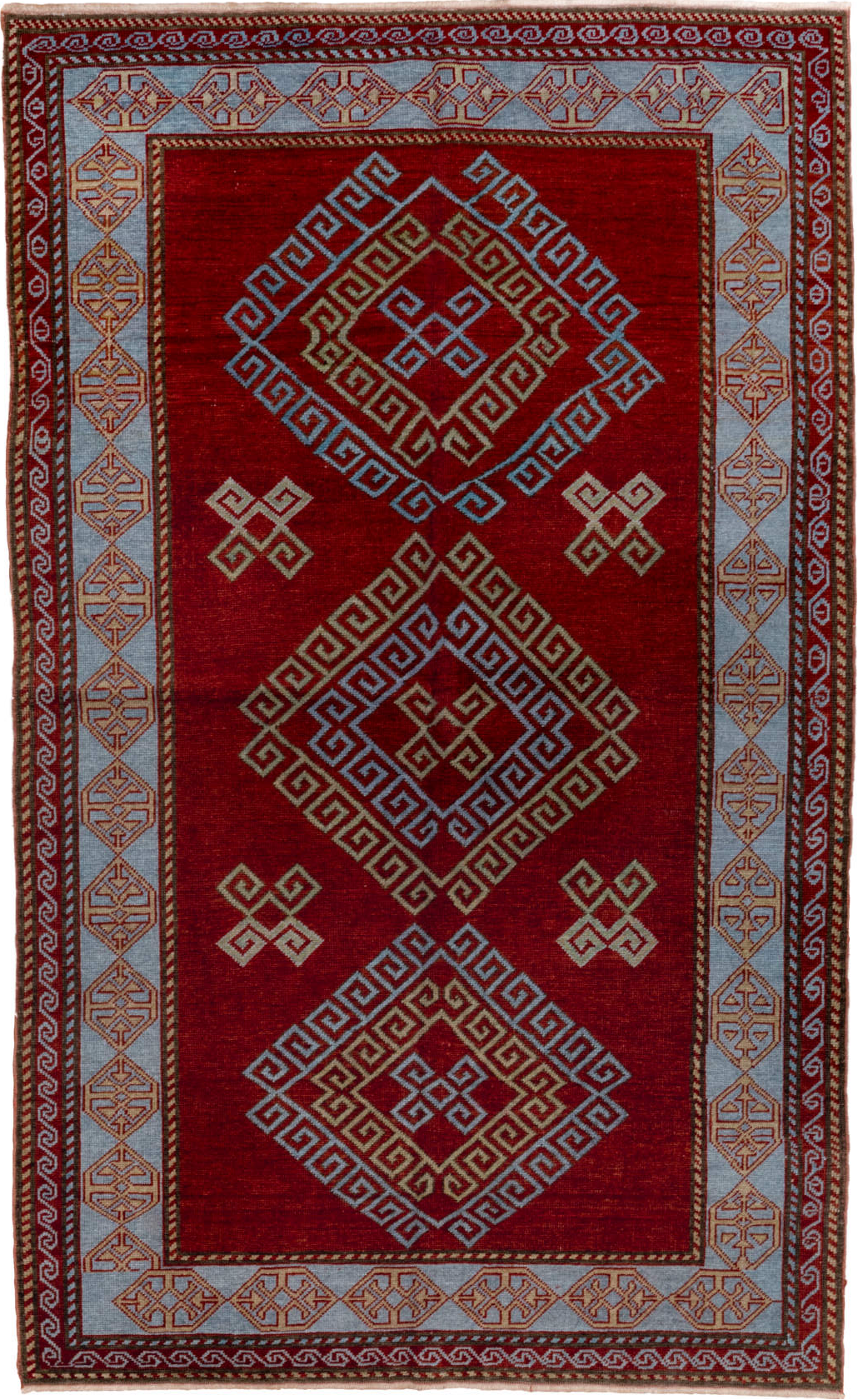 4' x 6' one-of-a-kind handmade vintage Caucasian small size rug. Color palette: brown, red, gray, pink, blue