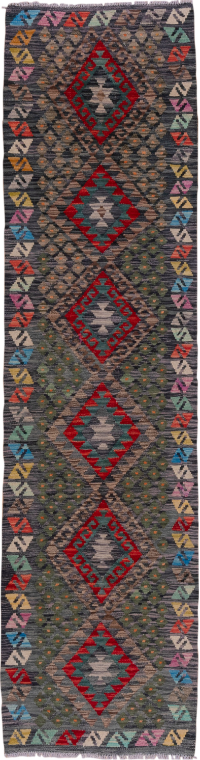 2' x 9' one-of-a-kind handmade vintage Kilim runner rug. Color palette: black, blue, brown, gray, pink, red