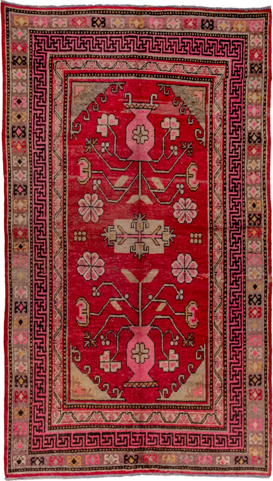 4' x 8' one-of-a-kind handmade vintage Khotan rug. Color palette: black, brown, pink, red