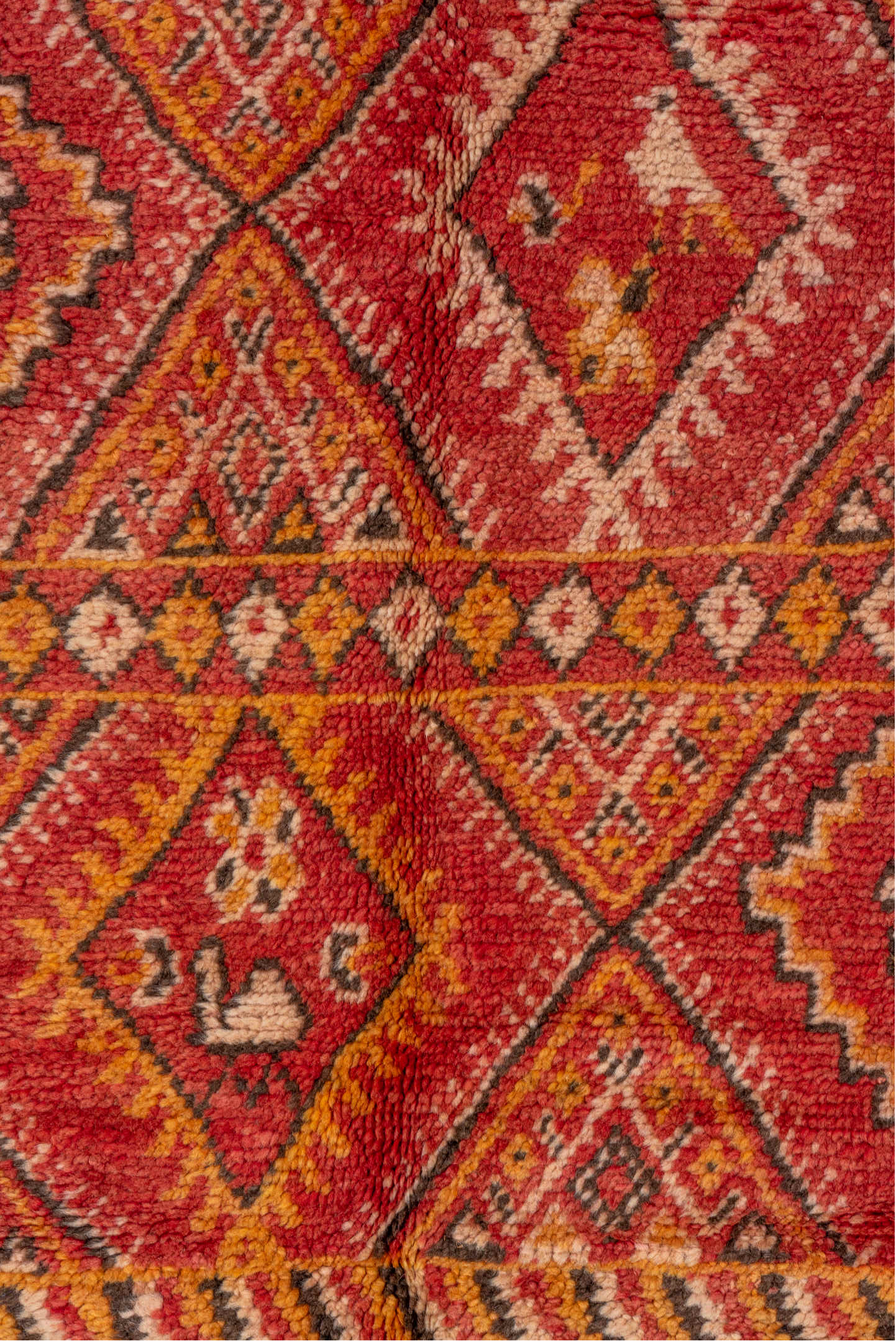 5' x 8' one-of-a-kind handmade vintage Moroccan medium size rug. Color palette: brown, pink, red, orange, dark red, peru