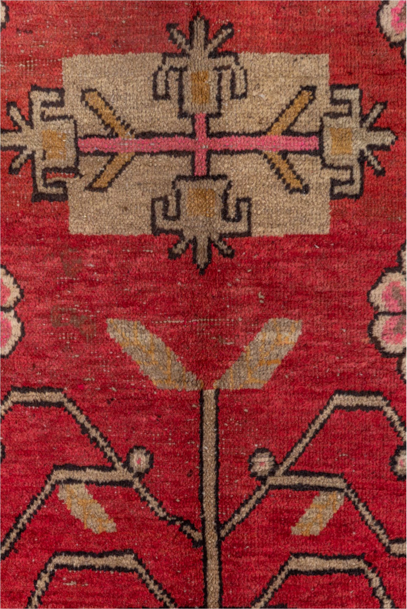 4' x 8' one-of-a-kind handmade vintage Khotan rug. Color palette: black, brown, pink, red