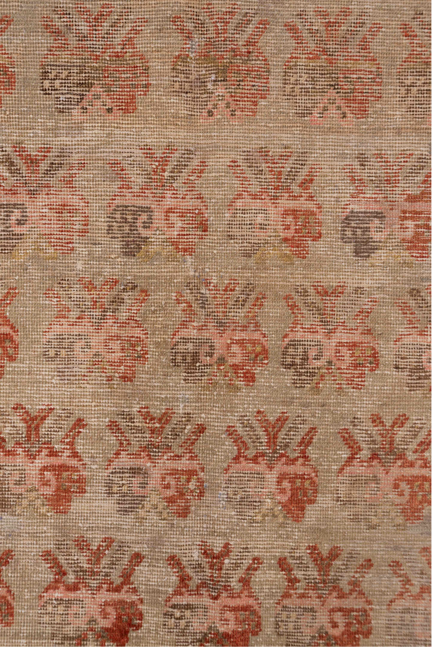 4' x 7' one-of-a-kind handmade vintage Khotan rug. Color palette: brown, pink, off-white, orange