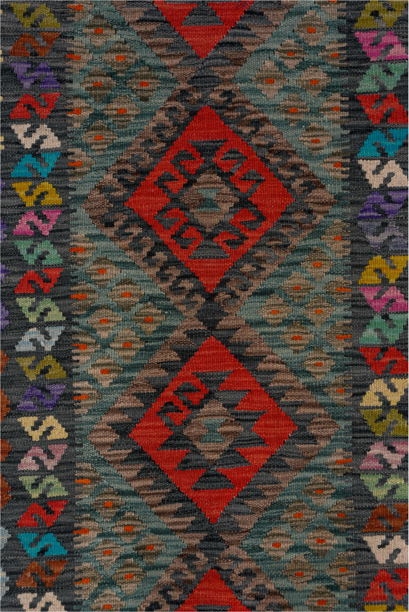 2' x 9' one-of-a-kind handmade vintage Kilim runner rug. Color palette: black, blue, brown, charcoal, gray, pink, red