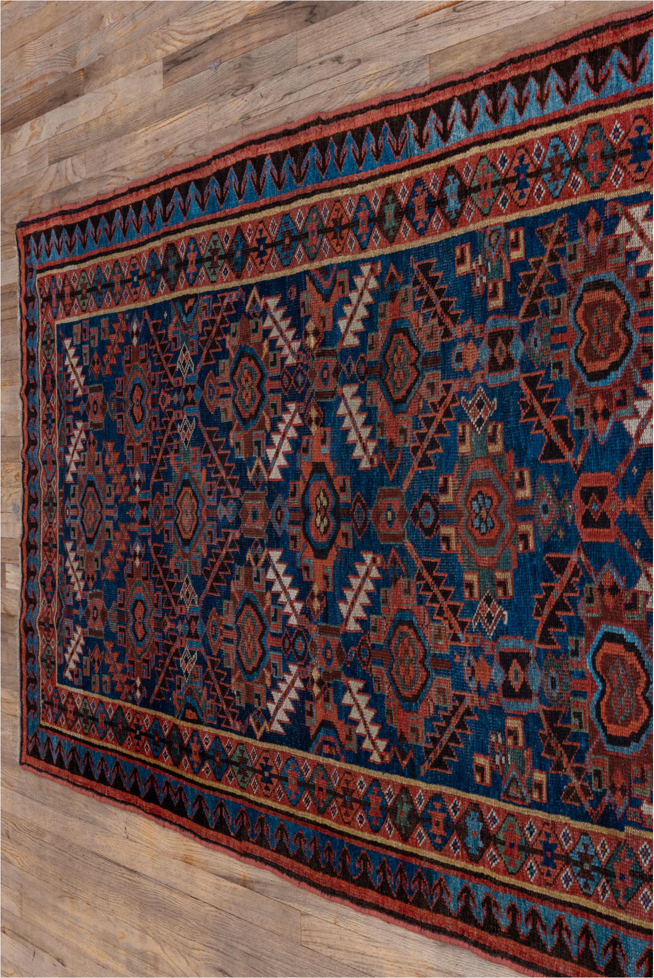4' x 7' one-of-a-kind handmade vintage NW Persian rug. Color palette: blue, brown, fiord, gray, pink, red, slate gray