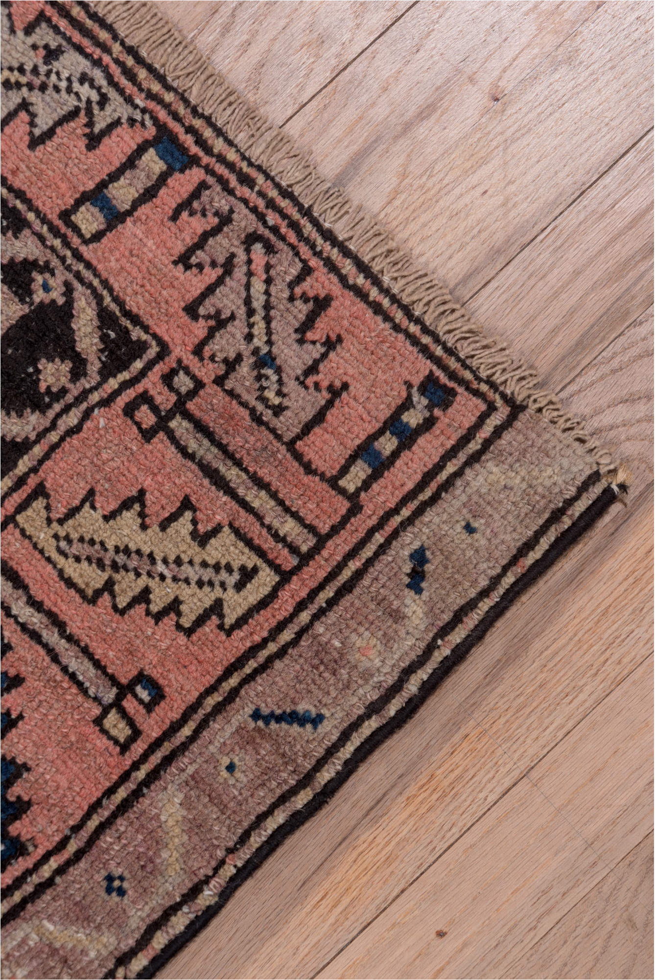 4' x 10' one-of-a-kind handmade vintage Malayer runner rug. Color palette: black, blue, brown, charcoal, gray, pink, red