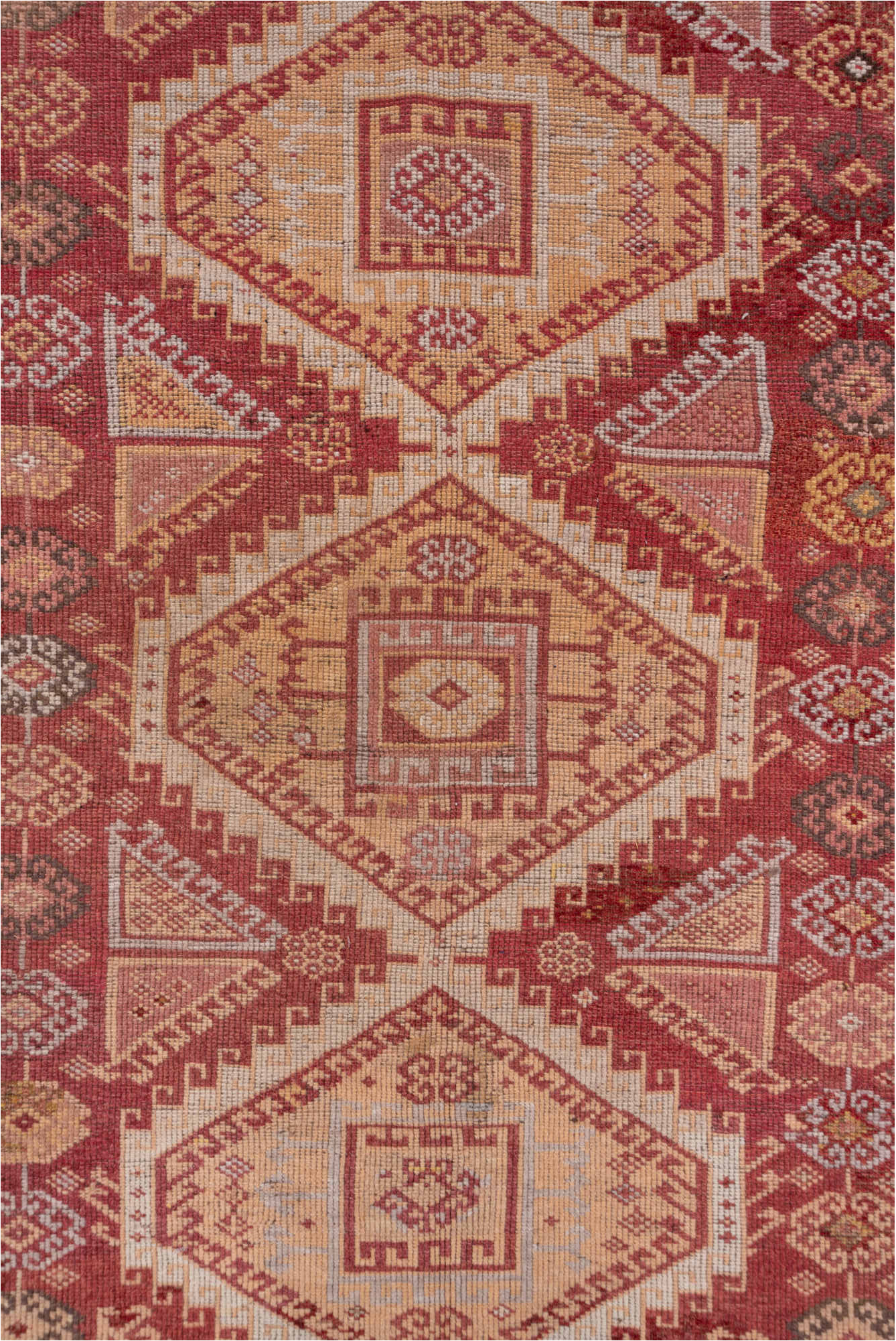 4' x 11' one-of-a-kind handmade vintage Kurd runner rug. Color palette: brown, pink, red