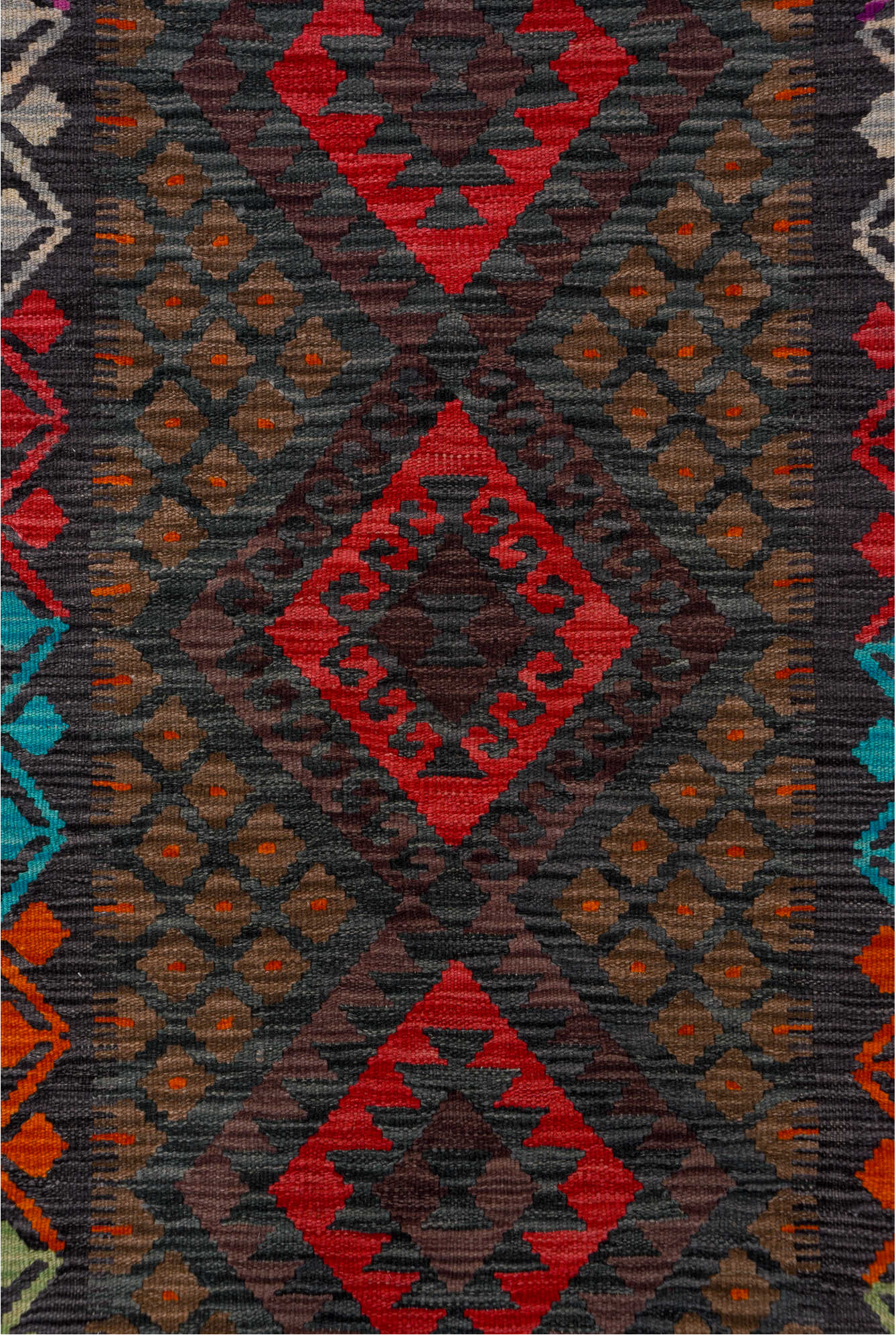 2' x 9' one-of-a-kind handmade vintage Kilim runner rug. Color palette: black, blue, brown, gray, pink, red, yellow