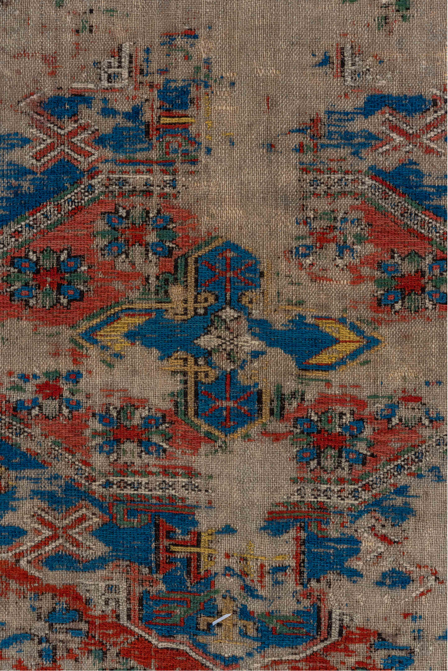 6' x 7' one-of-a-kind handmade vintage Sumak rug. Color palette: gray, brown, red, blue, black, maroon, redwood