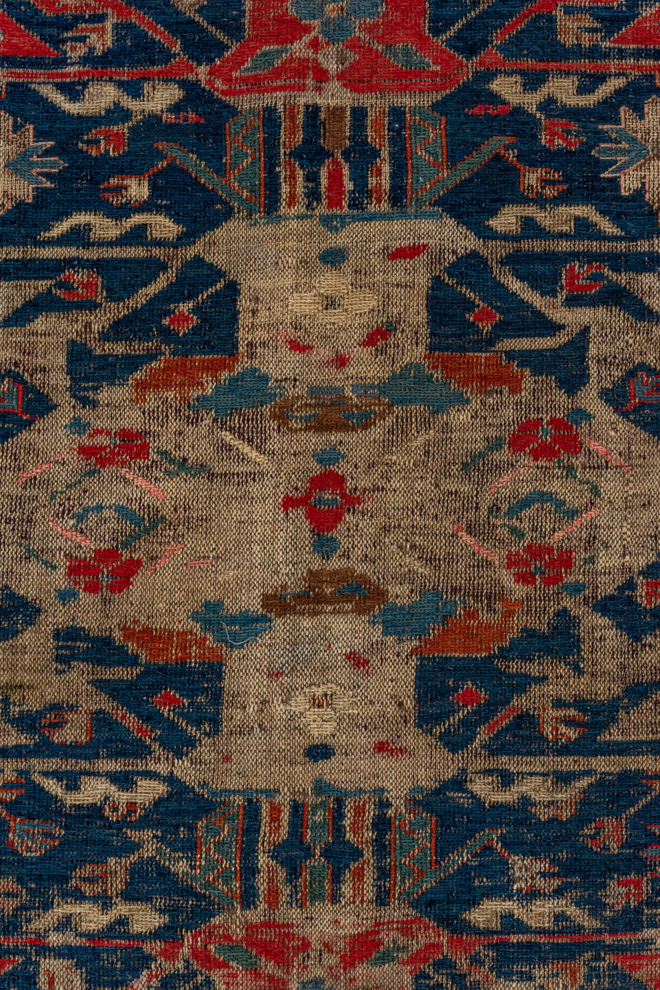5' x 9' one-of-a-kind handmade vintage Sumak medium size rug. Color palette: brown, red, gray, black, blue, pink, charcoal