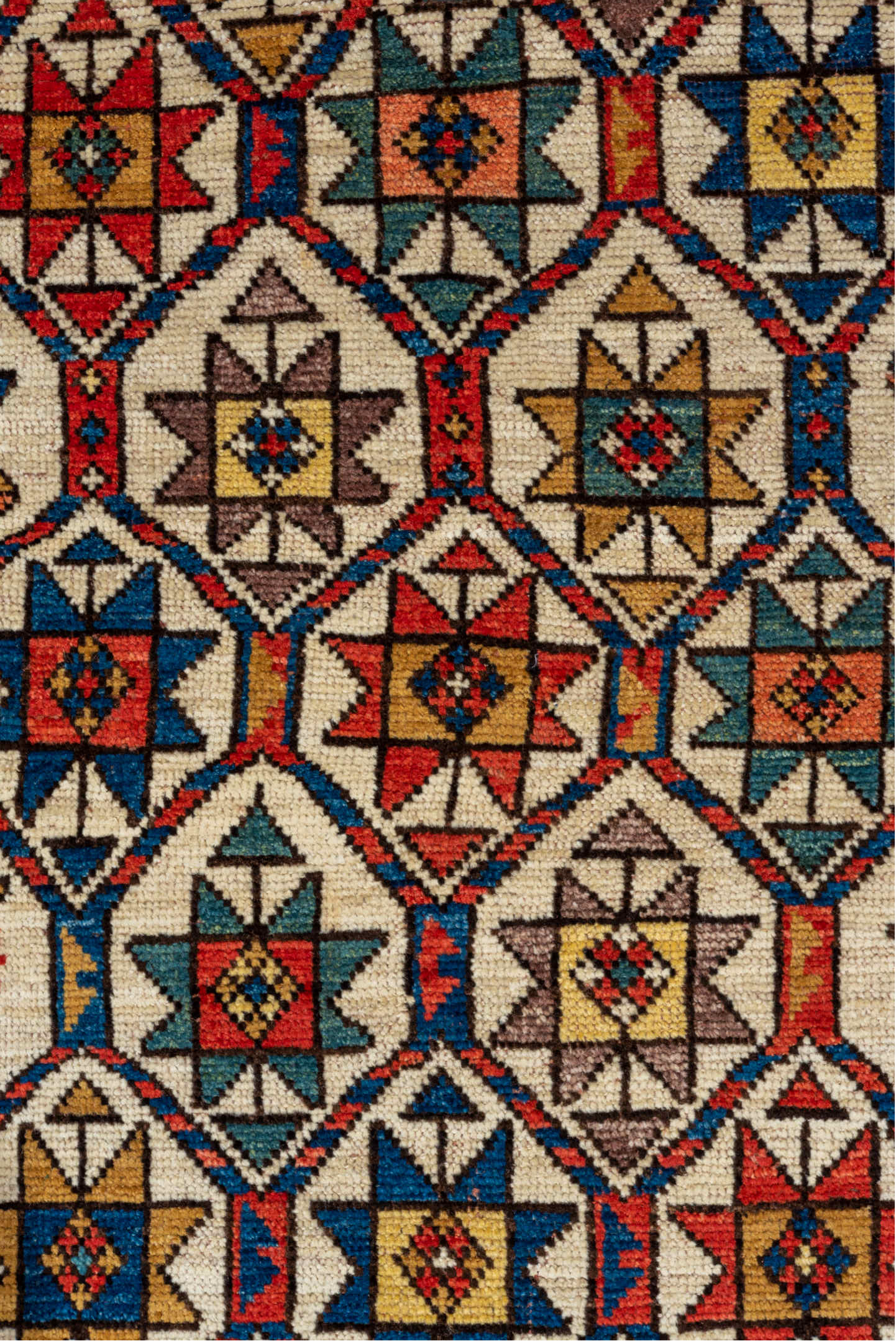 3' x 8' one-of-a-kind handmade vintage Kazak runner rug. Color palette: brown, red, gray, orange, blue