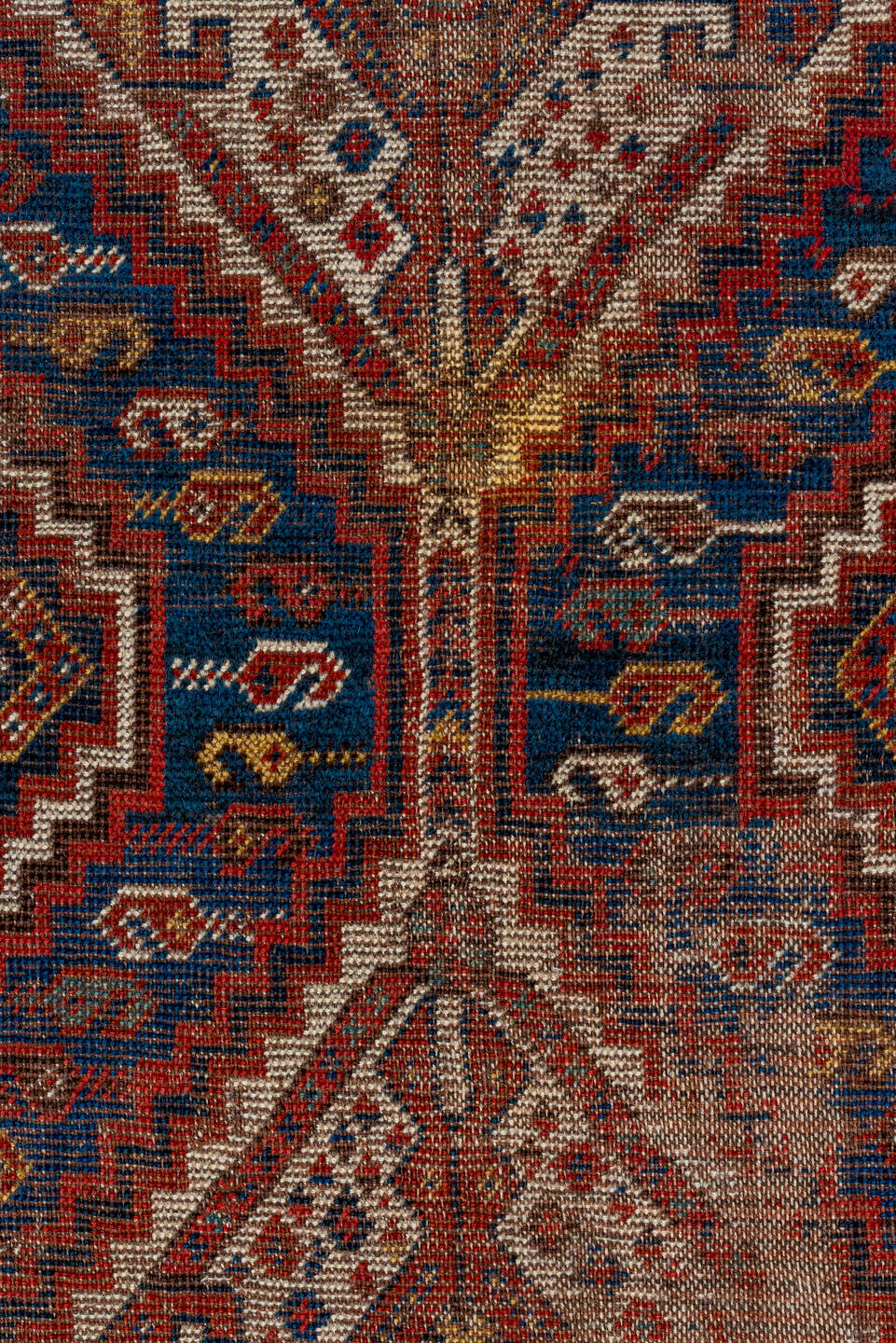 7' x 9' one-of-a-kind handmade vintage Shiraz rug. Color palette: brown, red, off-white, pink, light gray, gray, black, blue