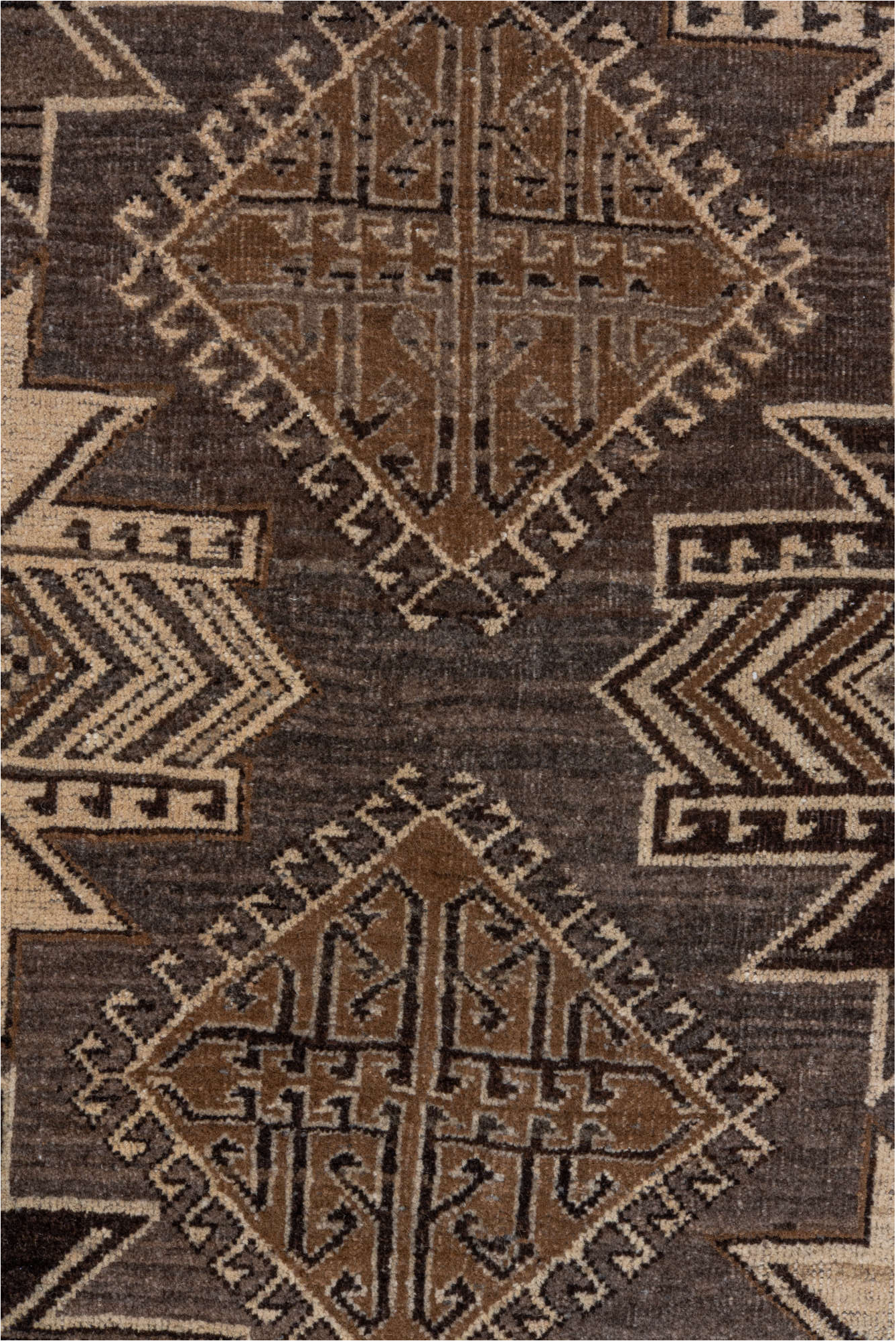 7' x 9' one-of-a-kind handmade vintage Afghan rug. Color palette: black, brown, charcoal, gray, light gray, off-white, pink