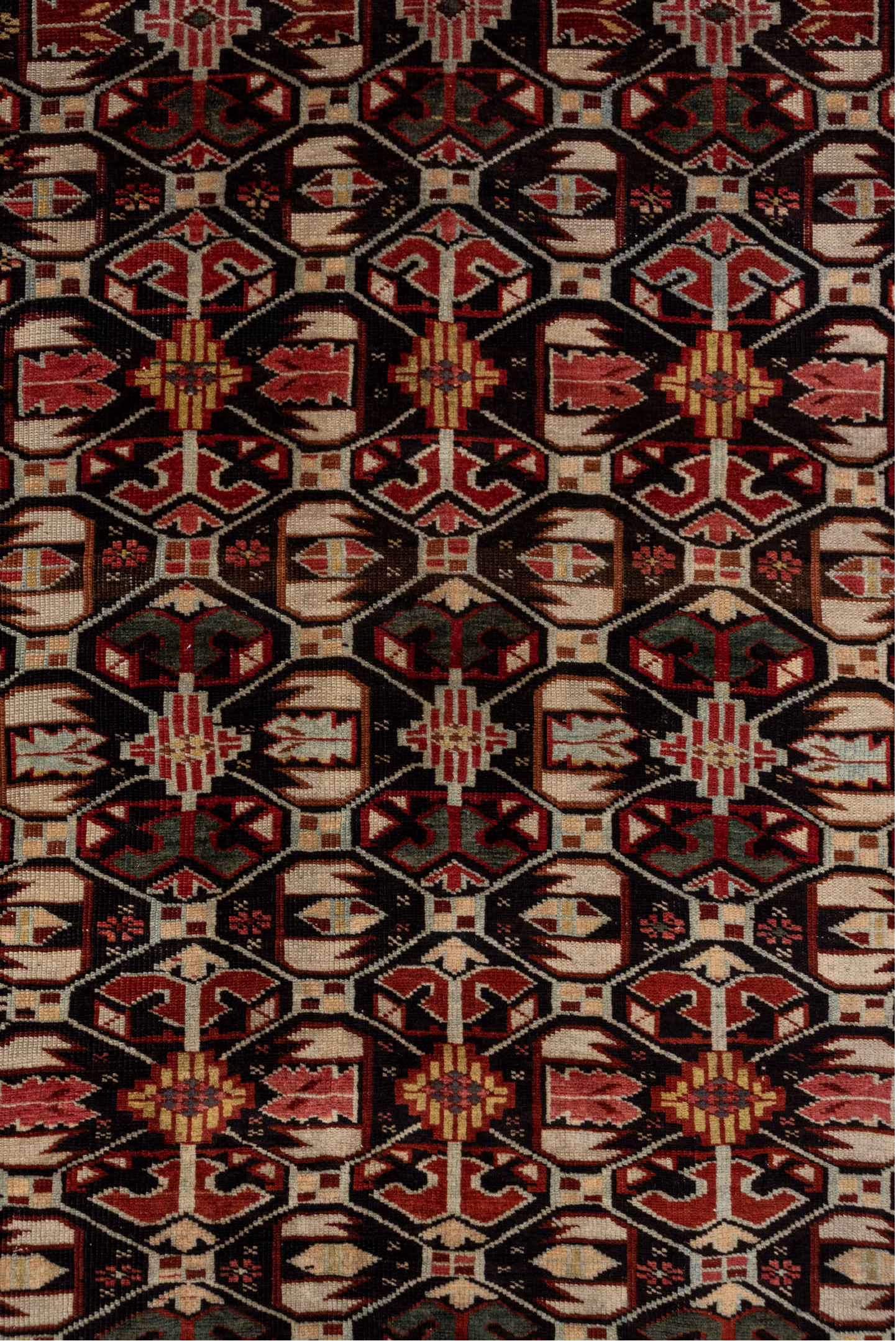 4' x 7' one-of-a-kind handmade vintage Kuba rug. Color palette: brown, pink, gray, red, black