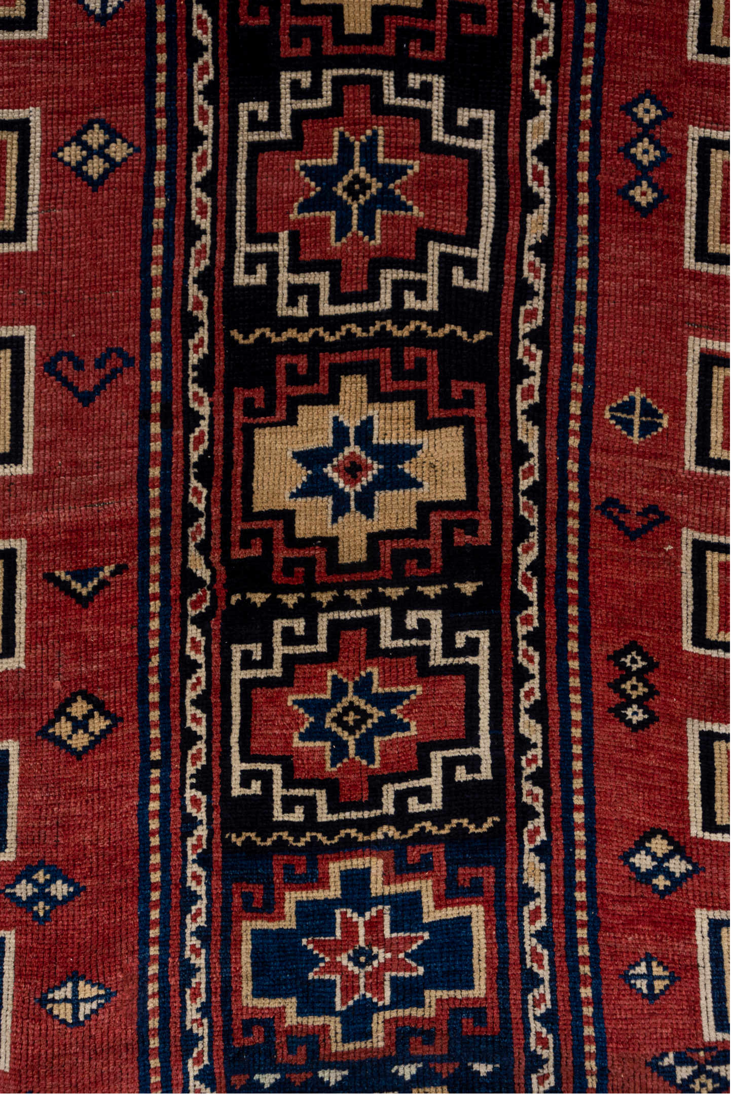 4' x 6' one-of-a-kind handmade vintage Trans Caucasian small size rug. Color palette: red, brown, gray, pink, black, wine