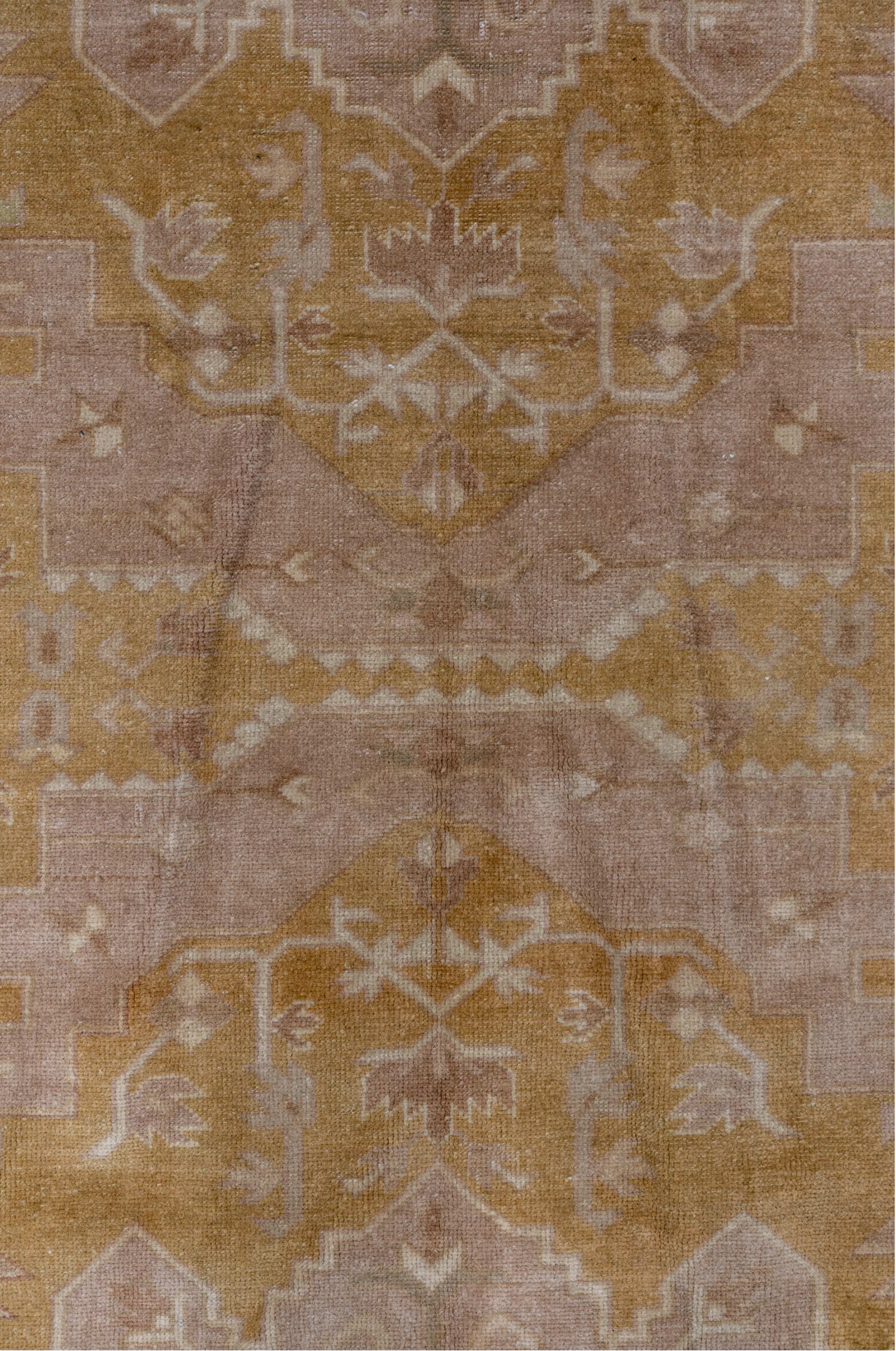 5' x 8' one-of-a-kind handmade vintage Caucasian medium size rug. Color palette: brown, pink, off-white, orange, light gray
