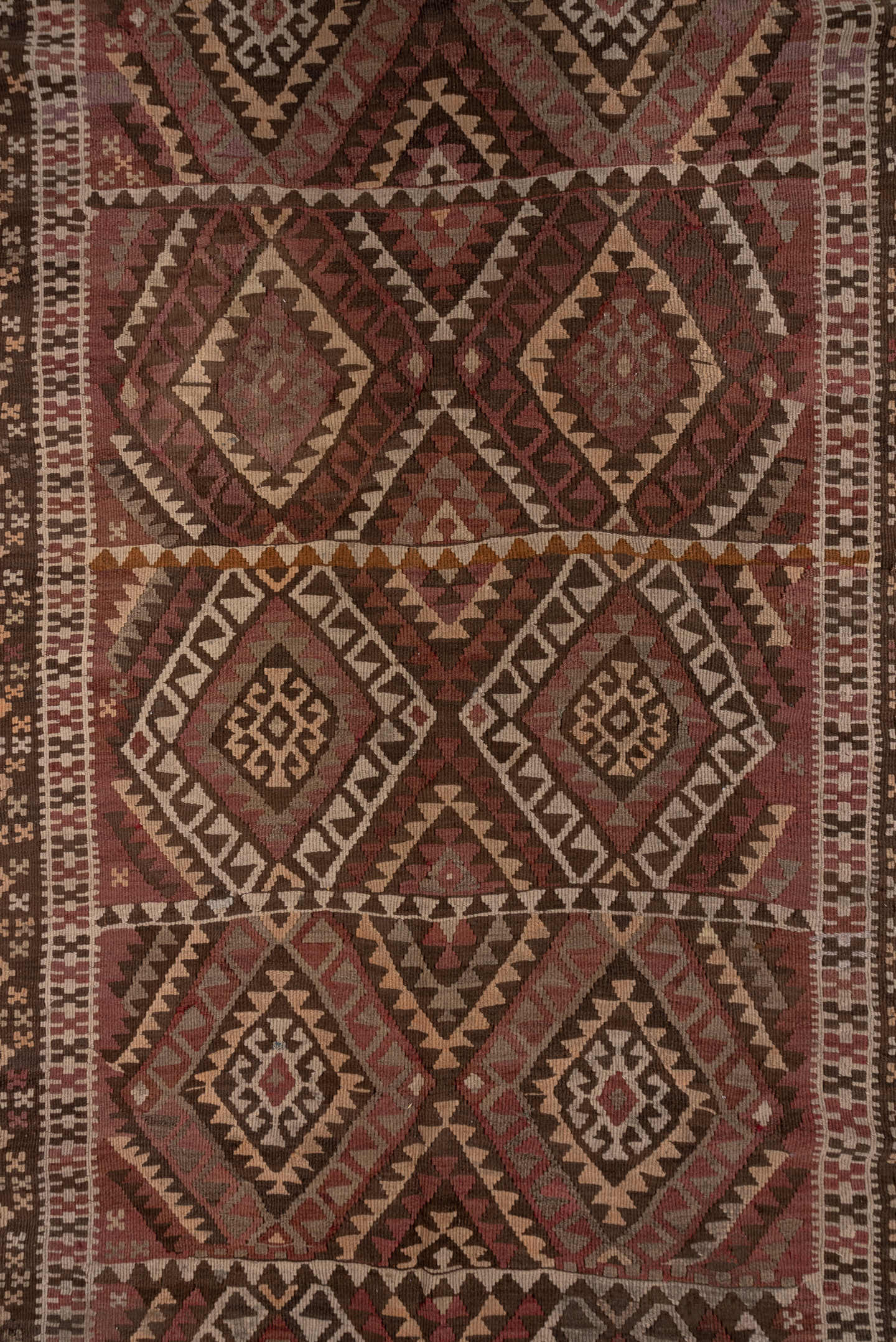 4' x 11' one-of-a-kind handmade vintage Kilim runner rug. Color palette: rose, rust, brown, ivory, taupe, mauve, pink, red