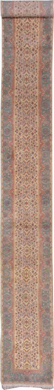 2' x 20' one-of-a-kind handmade vintage Kerman runner rug. Color palette: ivory, blue, rust, rose, gold, taupe, terracotta