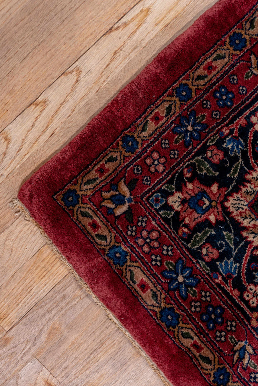10' x 14' one-of-a-kind handmade antique Lahor large size rug. Color palette: red, navy, ivory, blue, rust, camel, rose