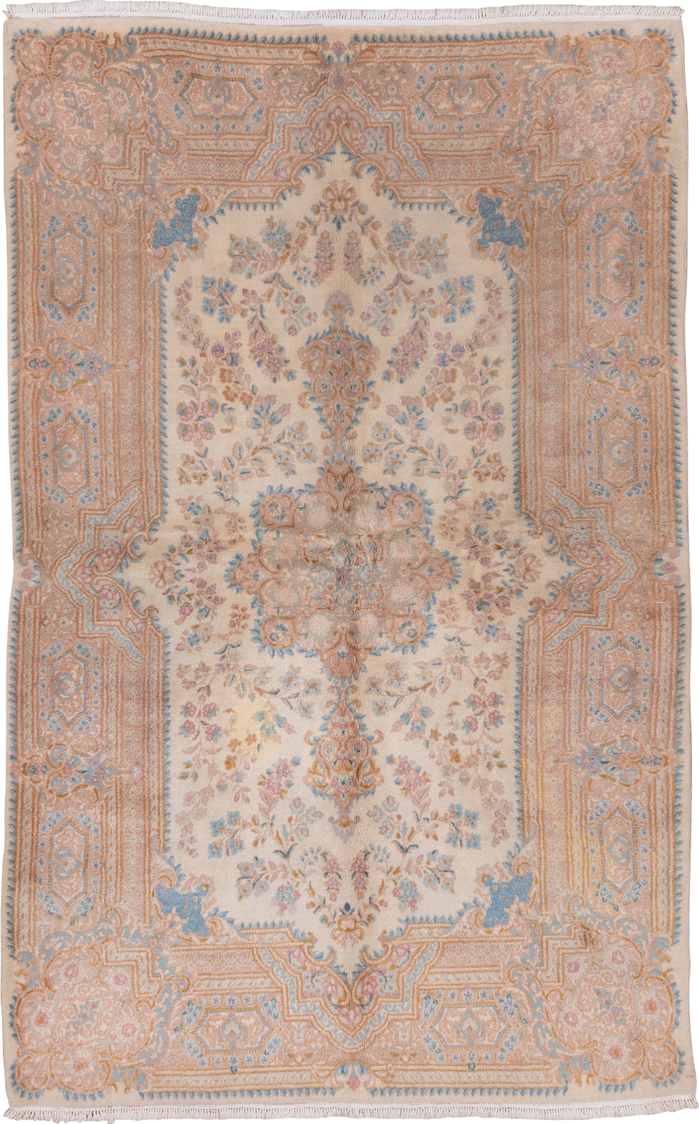 5' x 9' one-of-a-kind handmade vintage Kerman medium size rug. Color palette: ivory, beige, sky blue, blush, gold, taupe
