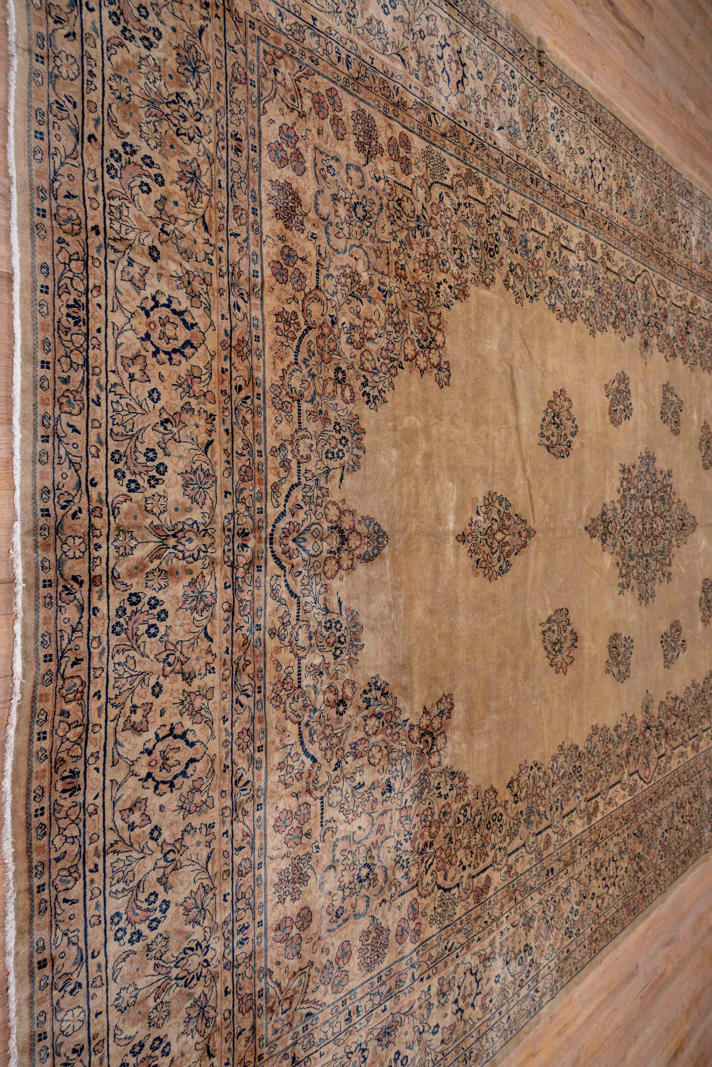12' x 18' one-of-a-kind handmade antique Sarouk oversize rug. Color palette: beige, ivory, slate, taupe, rust, camel