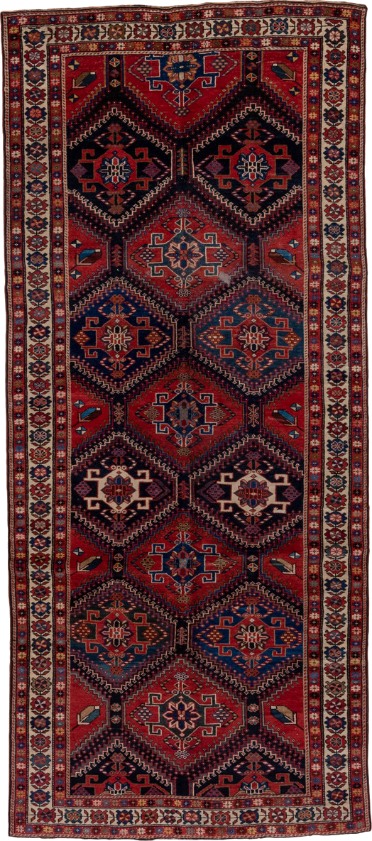 4' x 9' one-of-a-kind handmade vintage Baktiary runner rug. Color palette: black, blue, brown, fiord, gray, pink, red