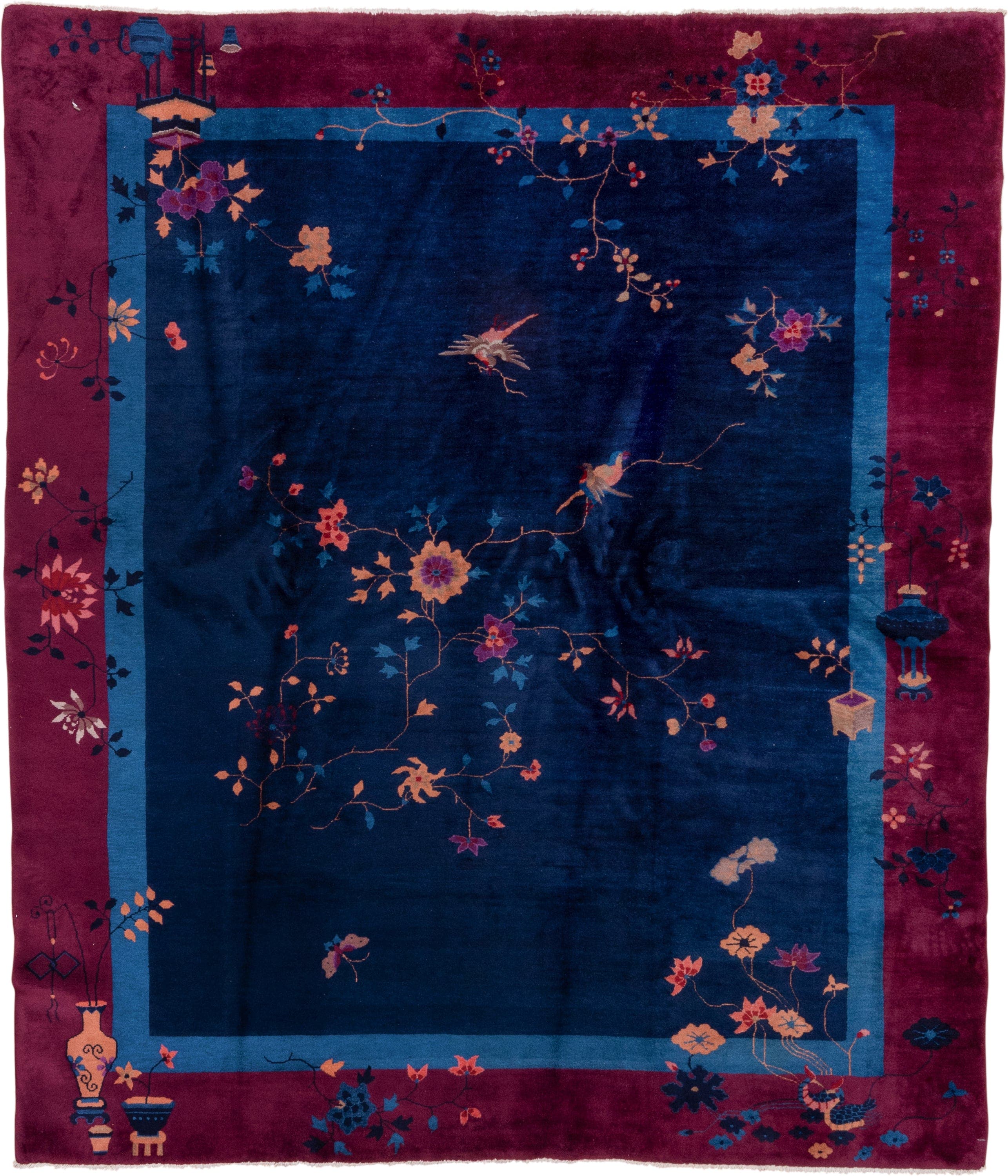 8' x 9' one-of-a-kind handmade antique Chinese rug. Color palette: navy, plum, sky_blue, peach, rose, indigo, ivory, blue