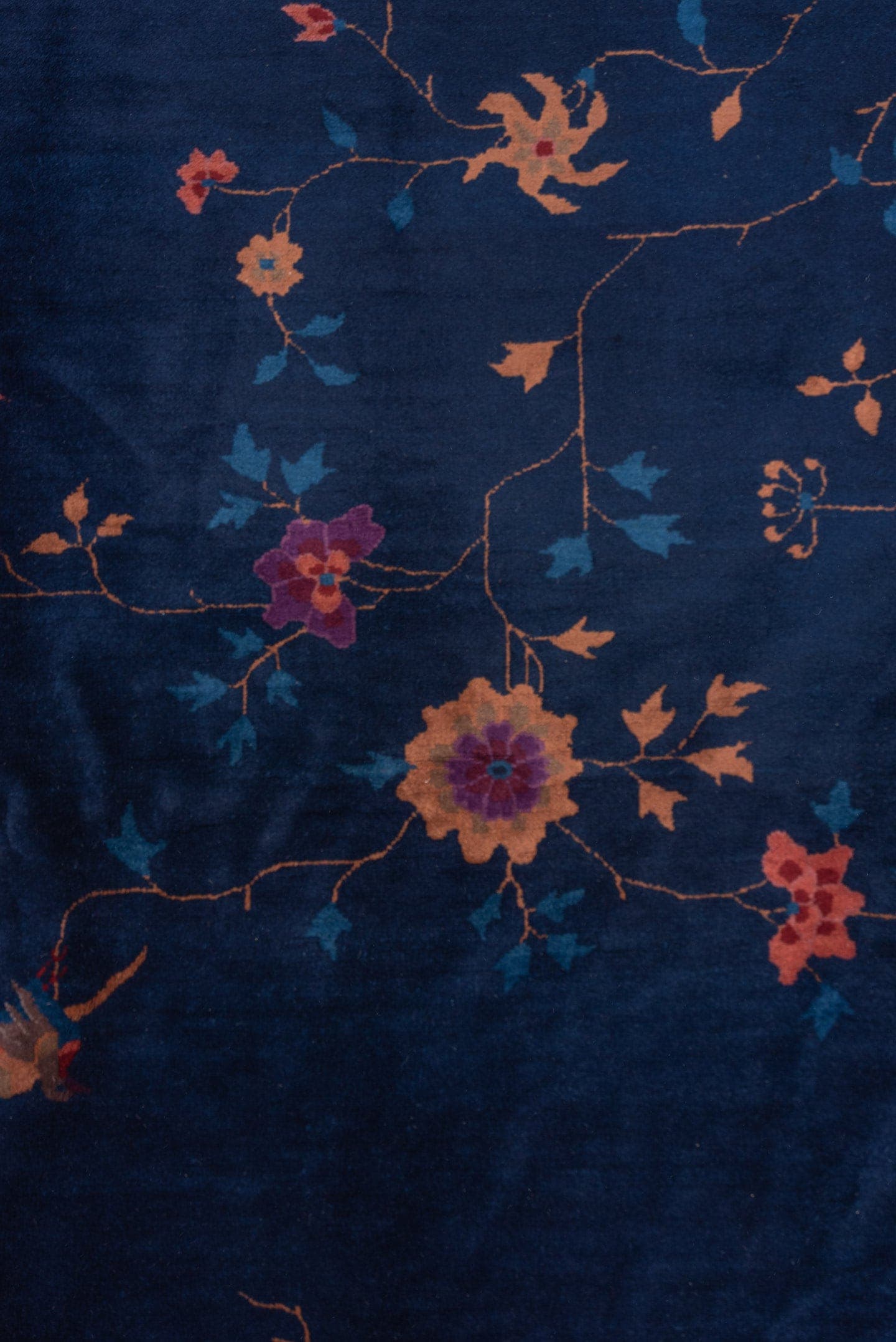 8' x 9' one-of-a-kind handmade antique Chinese rug. Color palette: navy, plum, sky_blue, peach, rose, indigo, ivory, blue