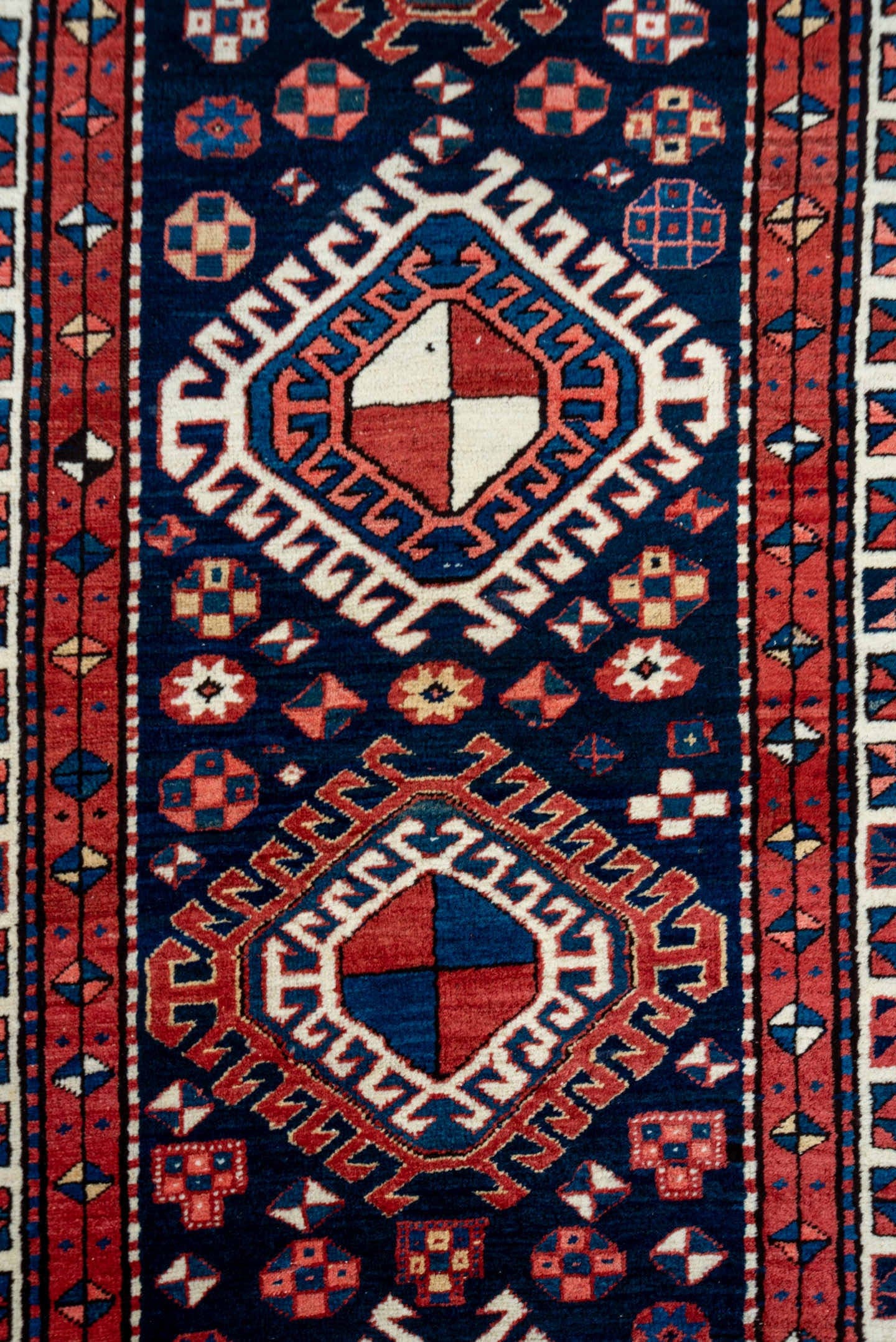 3' x 11' one-of-a-kind handmade antique NW Persian runner rug. Color palette: navy, ivory, rust, indigo, rose, sky_blue