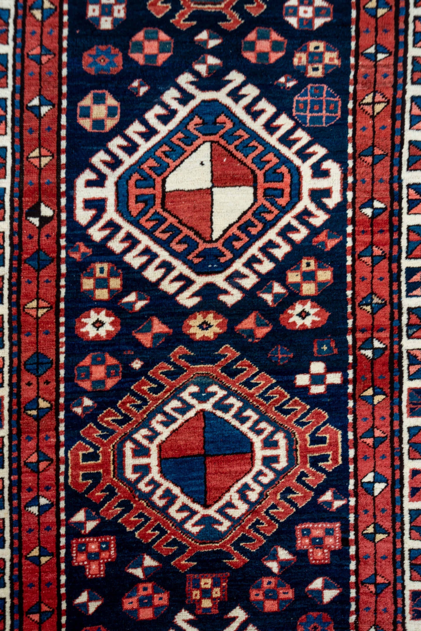 3' x 11' one-of-a-kind handmade antique NW Persian runner rug. Color palette: navy, ivory, rust, indigo, rose, sky_blue