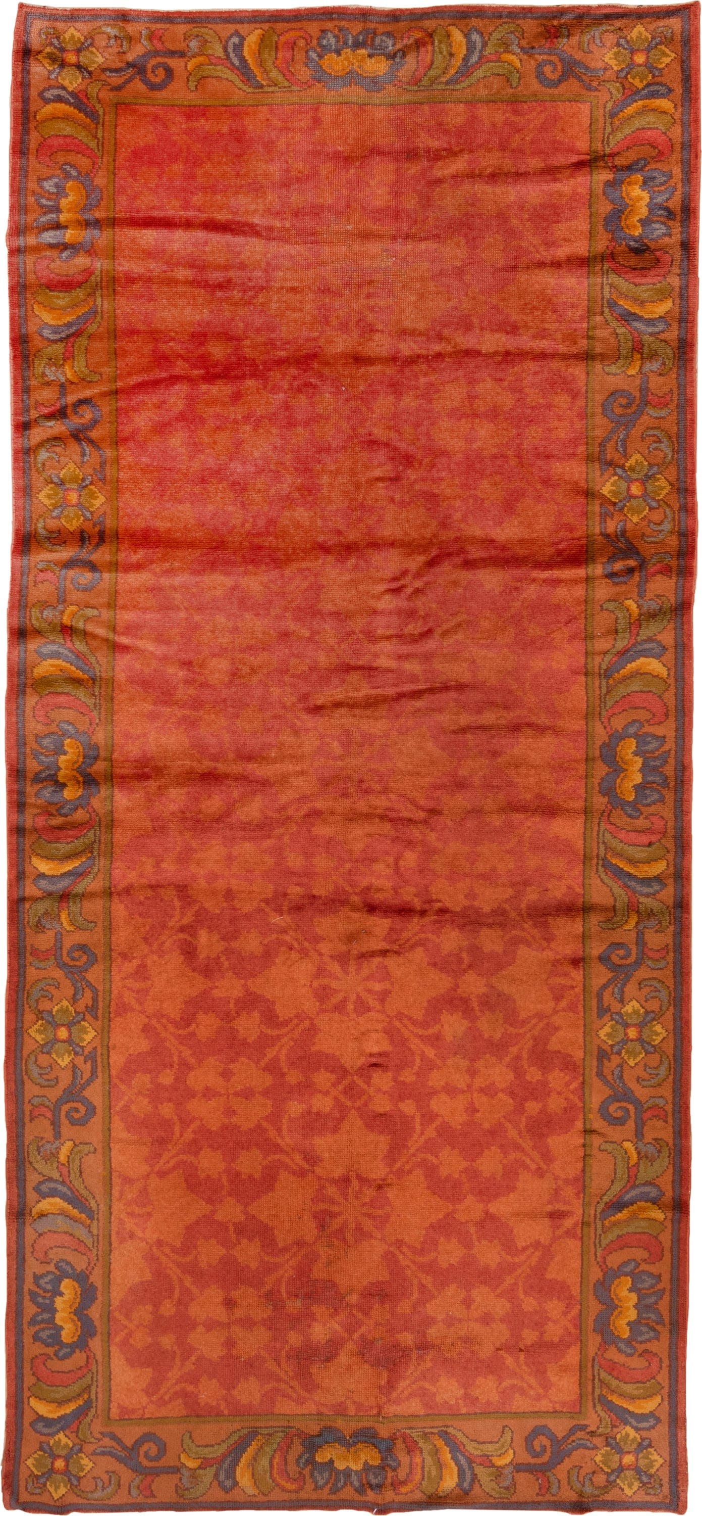 6' x 14' one-of-a-kind handmade handmade Donegal rug. Color palette: terra cotta, rust, coral, gold, slate, olive