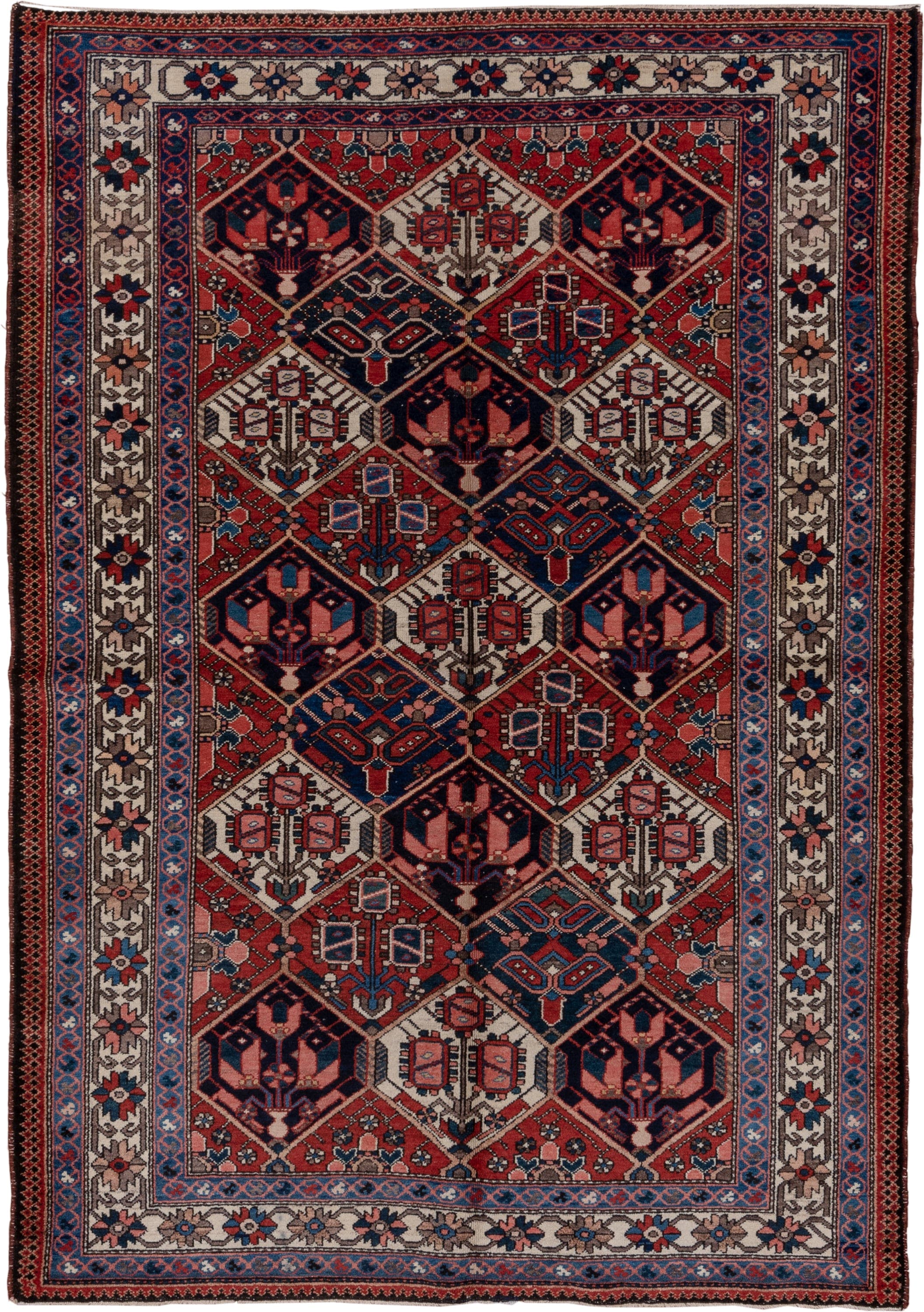 5' x 7' one-of-a-kind handmade antique Baktiary rug. Color palette: rust, ivory, navy, sky_blue, rose, charcoal, slate