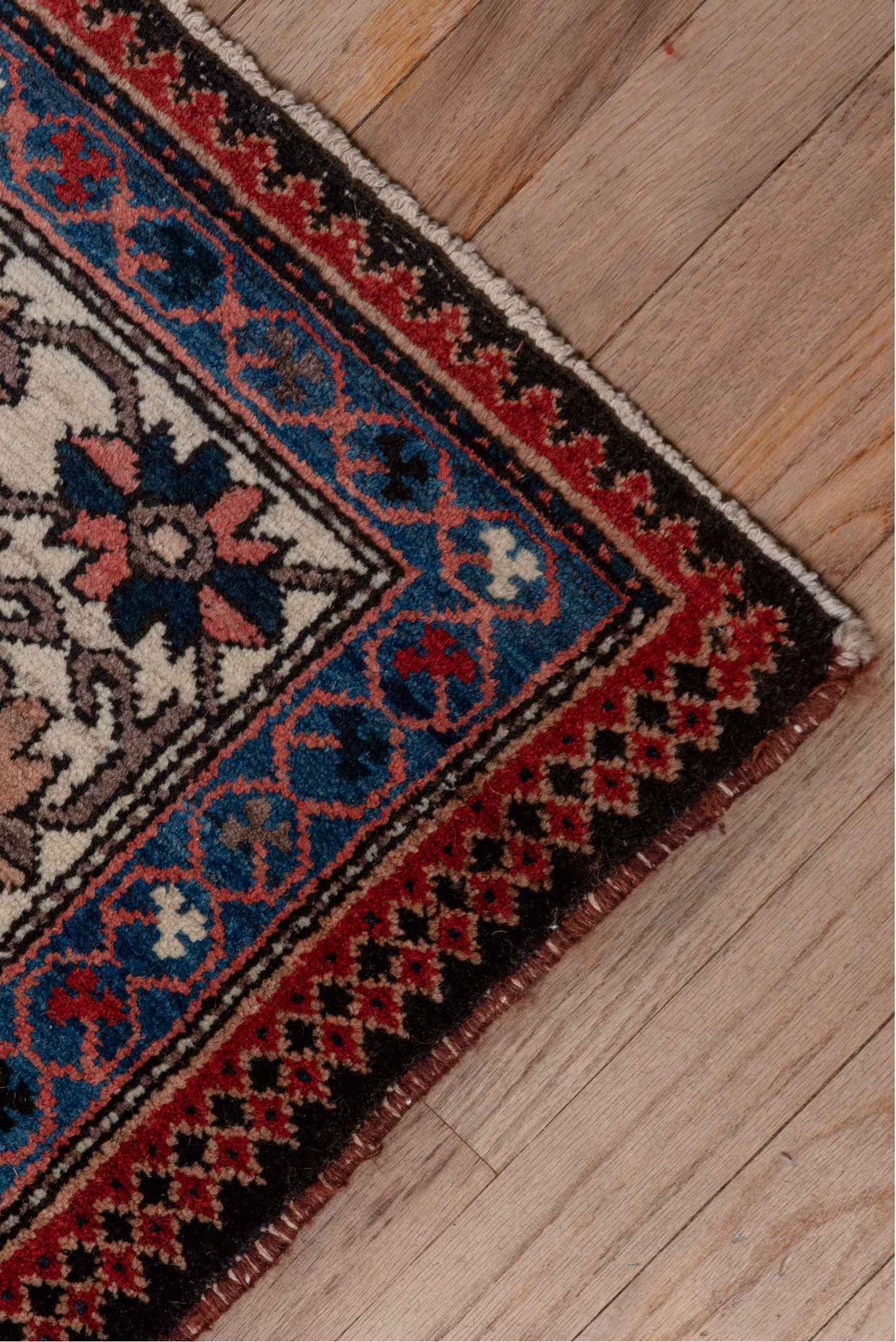 5' x 7' one-of-a-kind handmade vintage Baktiary rug. Color palette: black, blue, brown, charcoal, fiord, gray, light gray