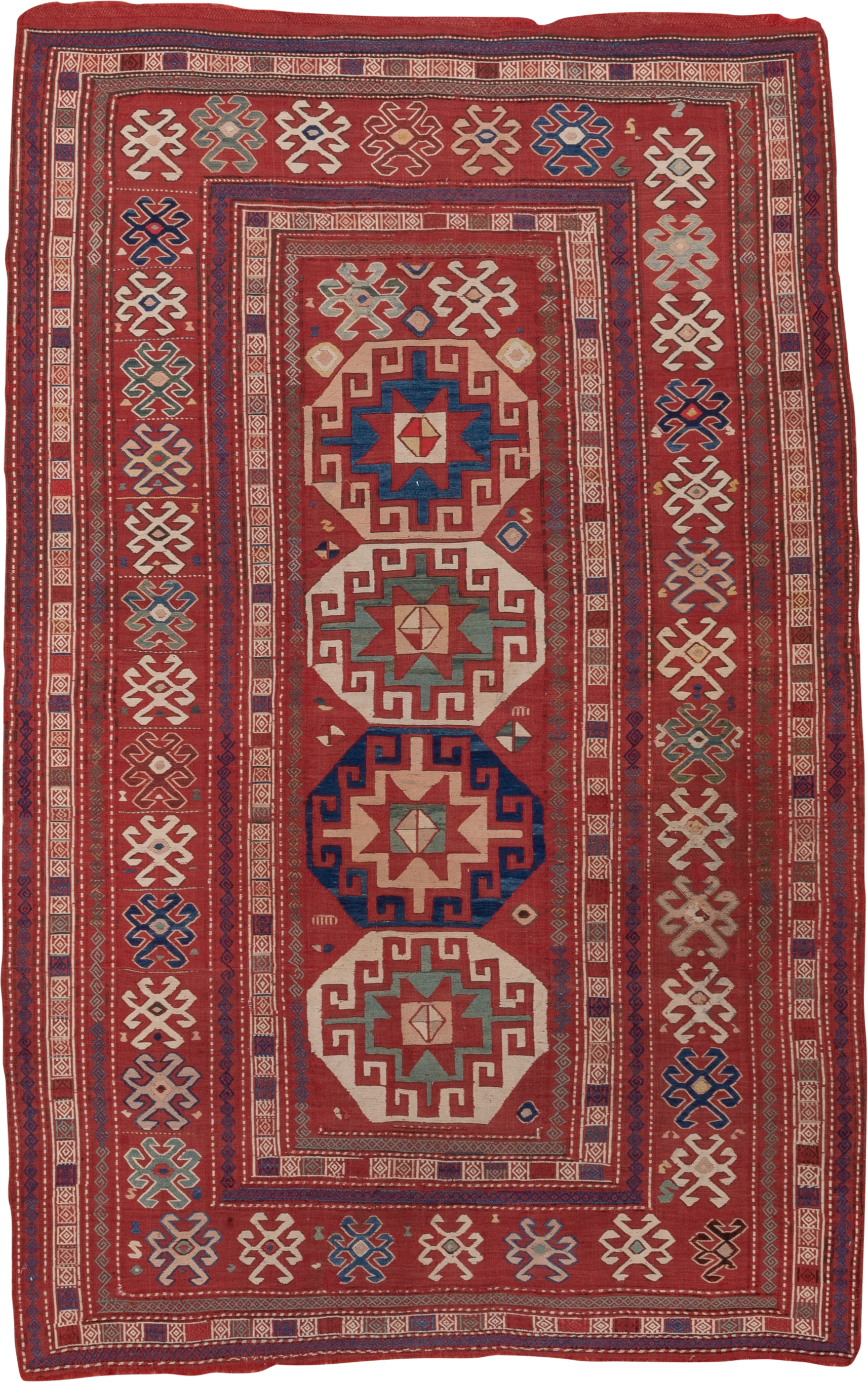 5' x 8' one-of-a-kind handmade antique Sumak medium size rug. Color palette: rust, ivory, indigo, terra cotta, sage, camel