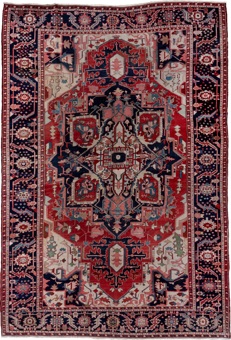 9' x 13' one-of-a-kind handmade antique Serapi large size rug. Color palette: rust, navy, ivory, sky_blue, rose, slate