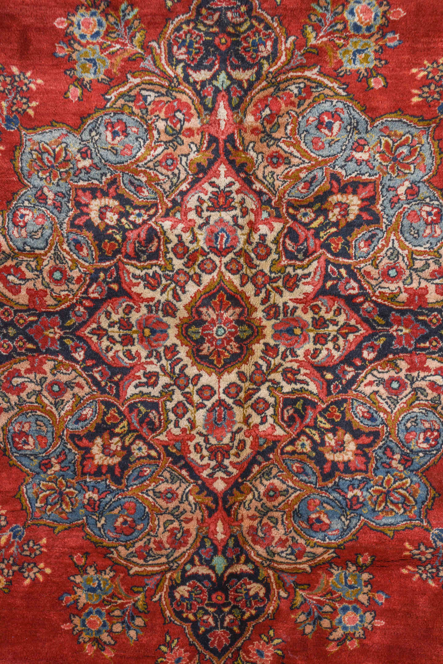 10' x 13' one-of-a-kind handmade antique Sarouk large size rug. Color palette: red, navy, ivory, sky blue, rose, gold, camel