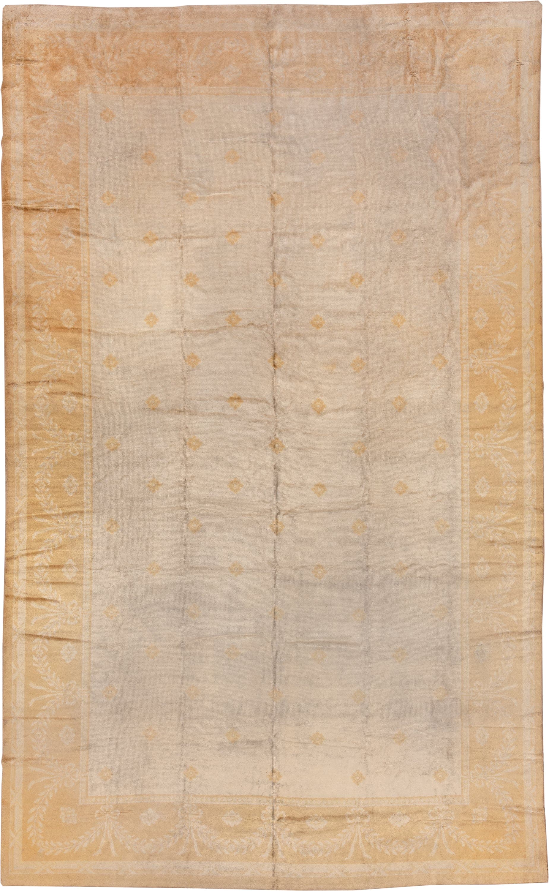 10' x 17' one-of-a-kind handmade antique Savonnerie rug. Color palette: ivory, camel, gold, cream, beige