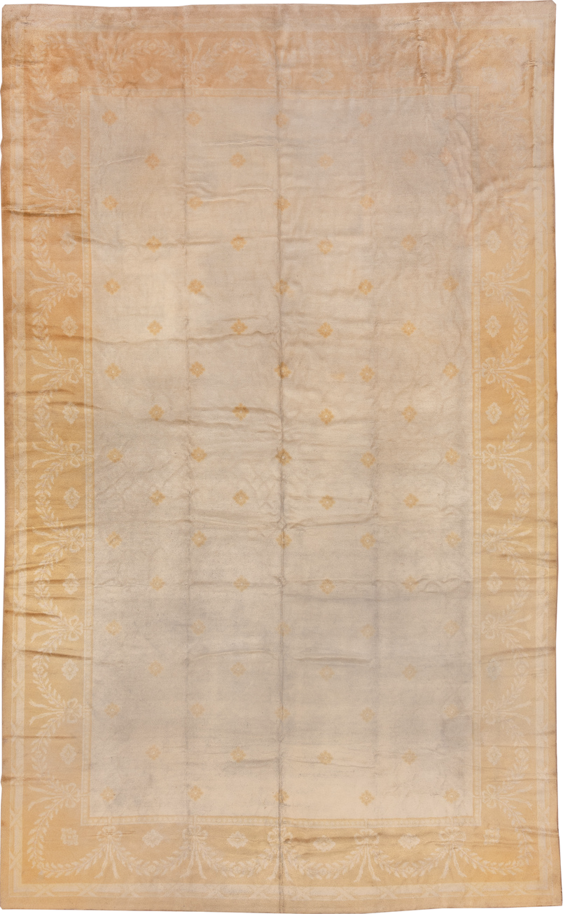 10' x 17' one-of-a-kind handmade vintage Savonnerie rug. Color palette: brown, gray, off-white, orange, pink, tan