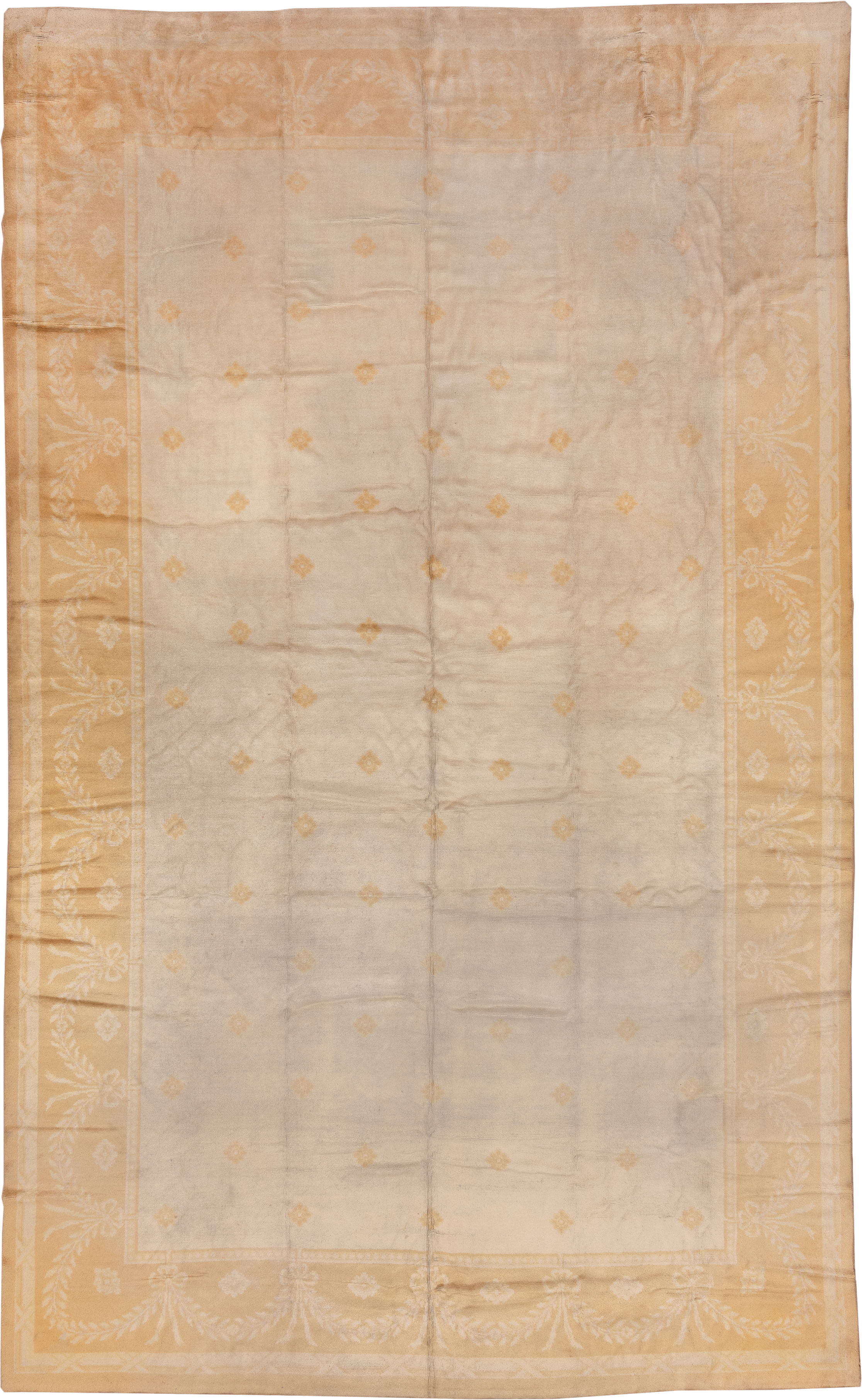 10' x 17' one-of-a-kind handmade antique Savonnerie rug. Color palette: ivory, camel, gold, cream, beige