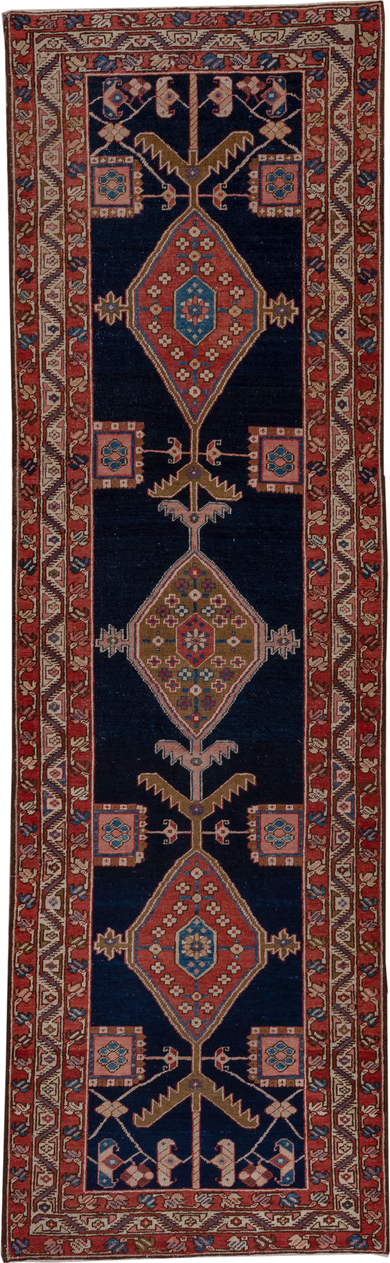 3' x 11' one-of-a-kind handmade antique Serapi runner rug. Color palette: navy, rust, ivory, camel, sky blue, rose, brown