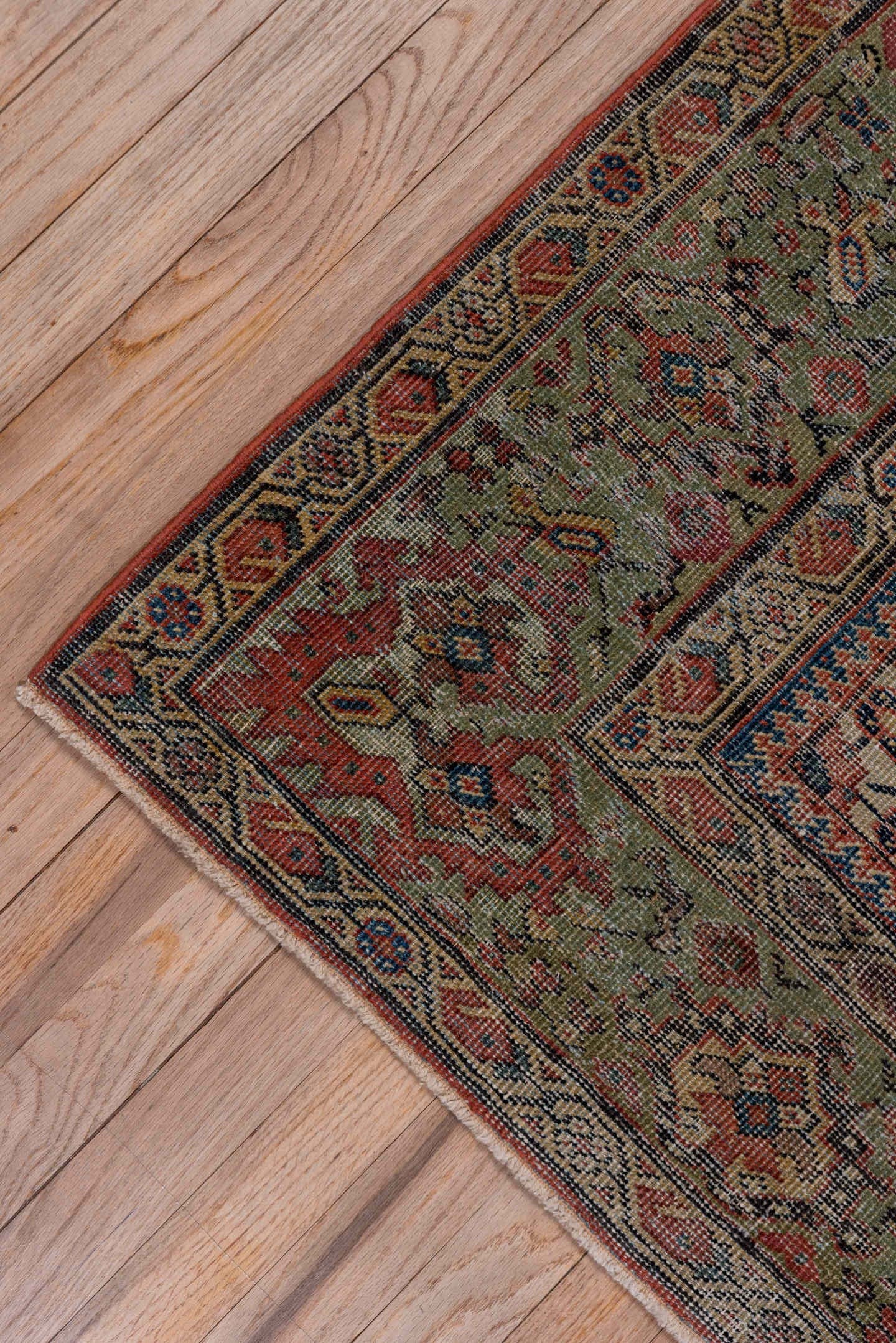 5' x 9' one-of-a-kind handmade antique Farahan medium size rug. Color palette: navy, olive, rust, ivory, terra cotta, sage