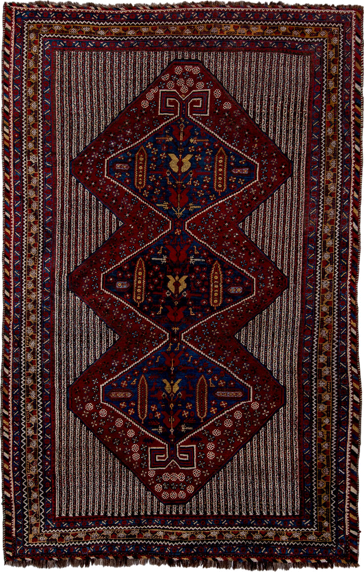 5' x 8' one-of-a-kind handmade antique Qashqai medium size rug. Color palette: rust, indigo, ivory, gold, navy, brown