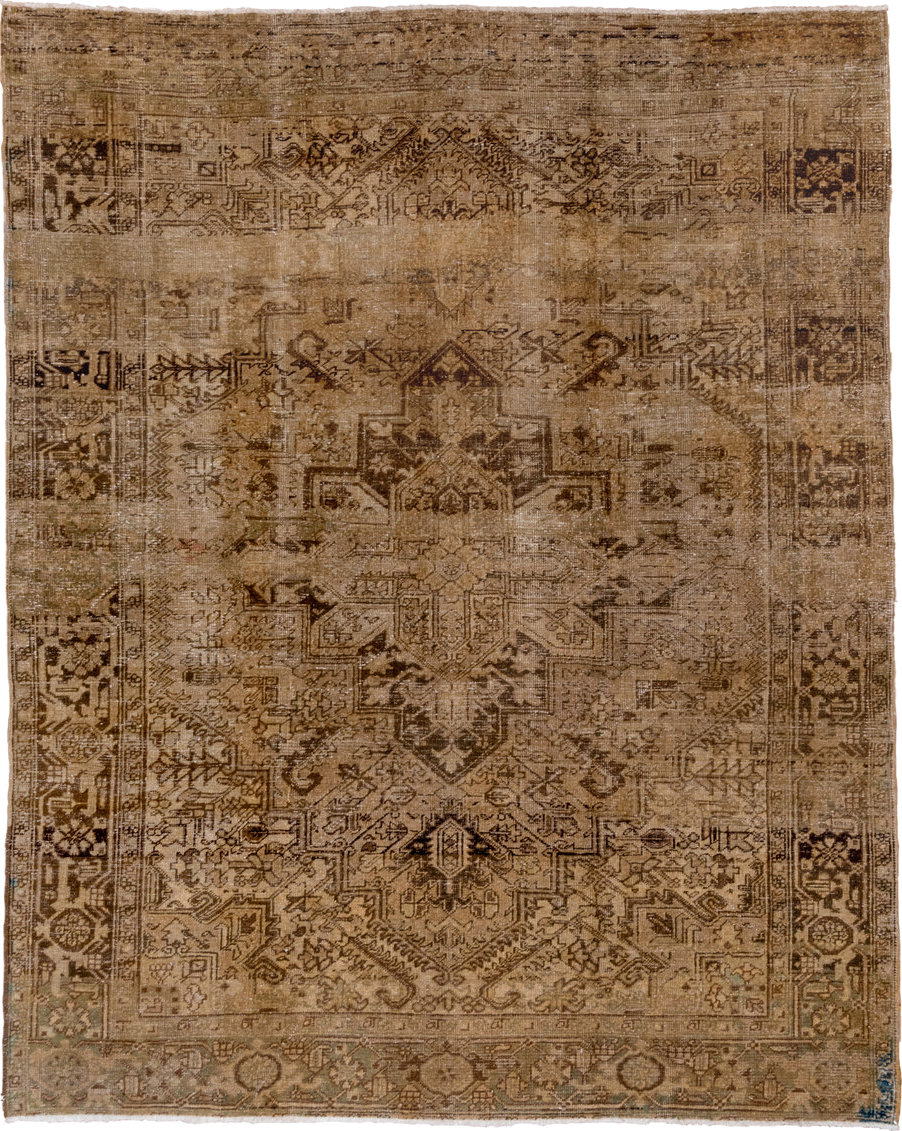 7' x 9' one-of-a-kind handmade antique Heriz rug. Color palette: taupe, camel, brown, ivory, charcoal, sage, slate, beige