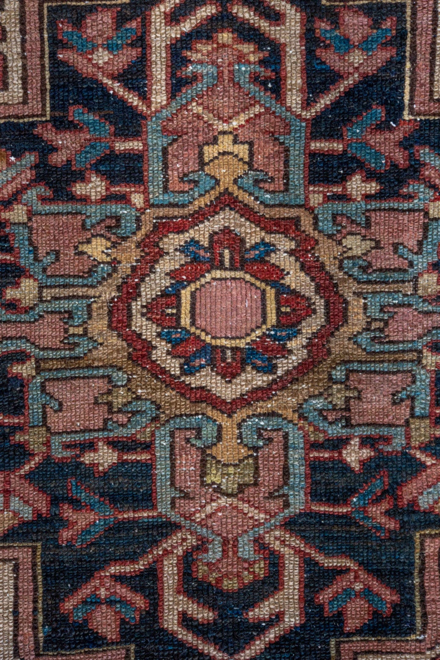 4' x 6' one-of-a-kind handmade antique Serapi small size rug. Color palette: rust, navy, ivory, teal, camel, rose, brown