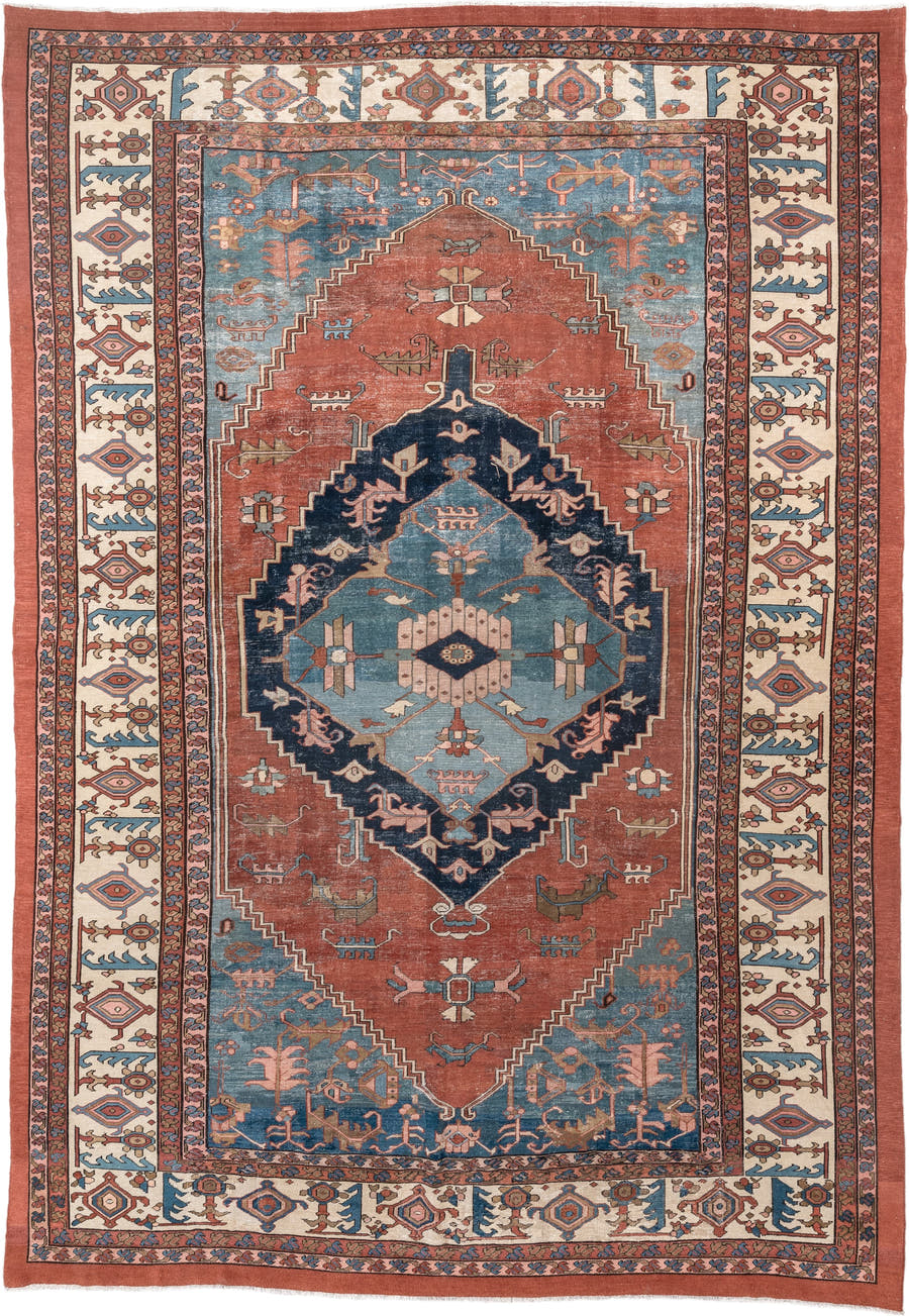 11' x 16' one-of-a-kind handmade vintage Serapi oversize rug. Color palette: terra cotta, ivory, sky blue, navy, rose