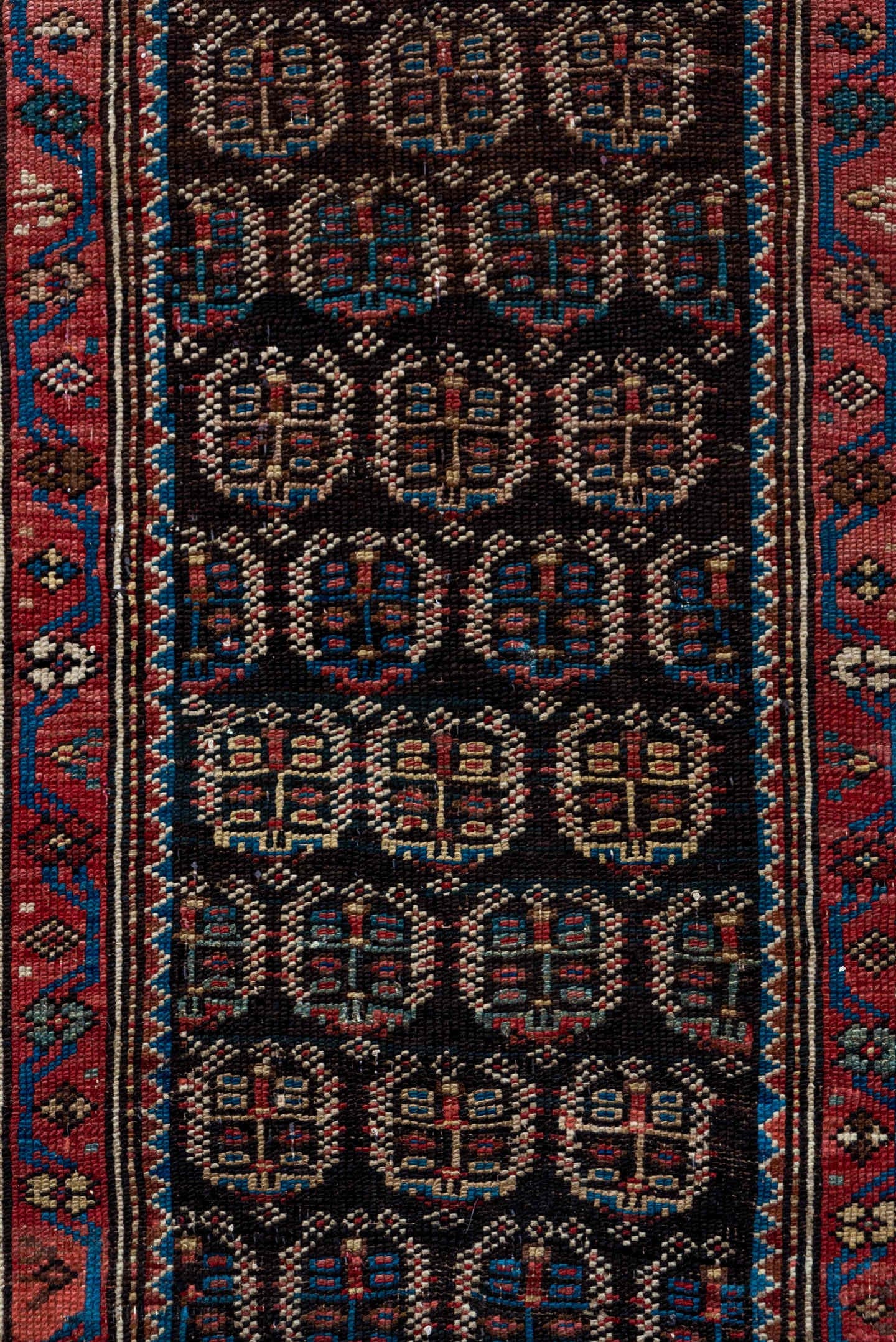 2' x 12' one-of-a-kind handmade antique Caucasian runner rug. Color palette: navy, rust, slate, ivory, rose, teal, charcoal