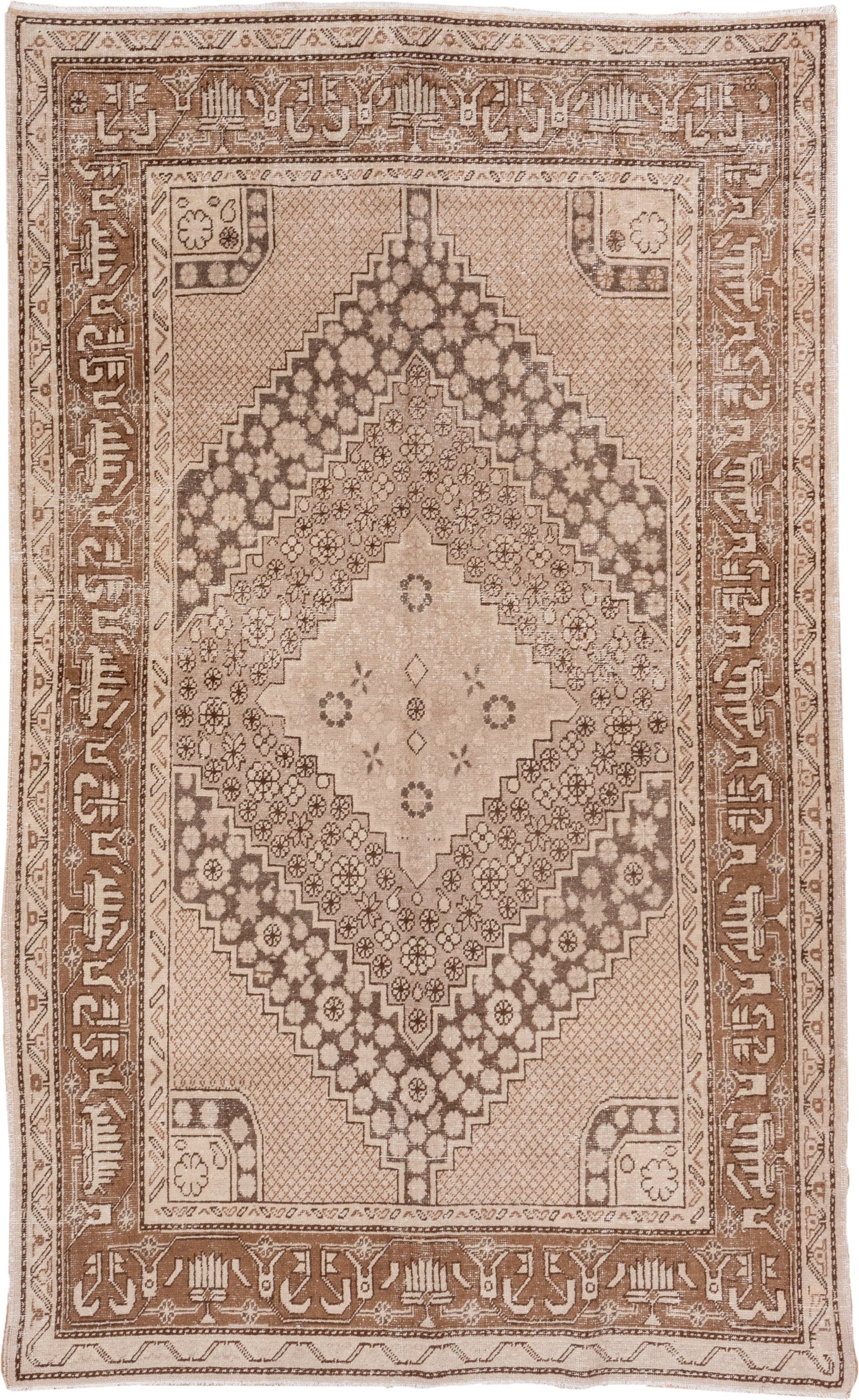 5' x 8' one-of-a-kind handmade antique Khotan medium size rug. Color palette: beige, camel, taupe, ivory, brown, gray