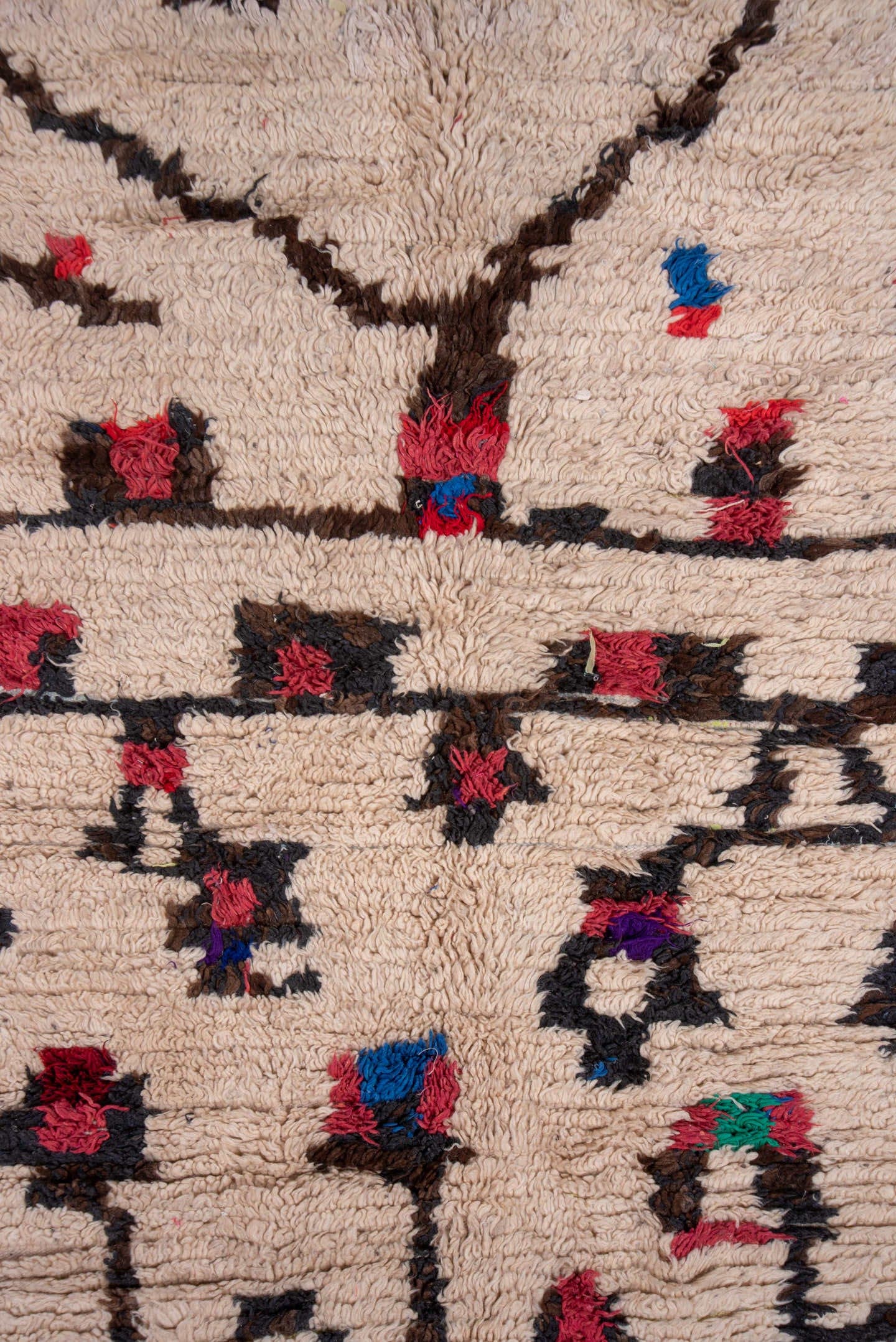 4' x 6' one-of-a-kind handmade vintage Moroccan small size rug. Color palette: ivory, brown, crimson, cobalt, teal, rose